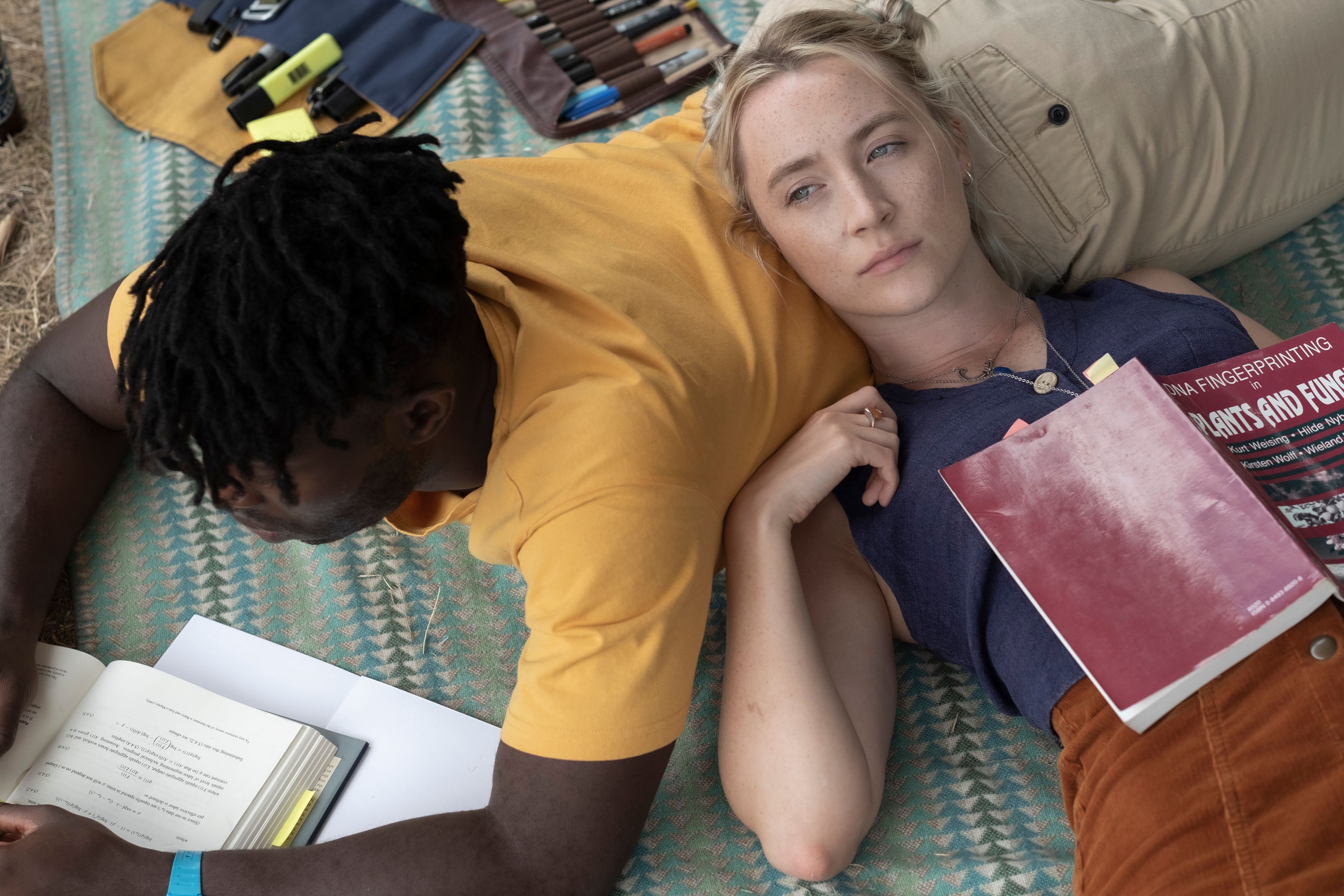 This image released by Sony Pictures Classics shows Paapa Essiedu, left, and Saoirse Ronan in a scene from "The Outrun." (Sony Pictures Classics via AP)