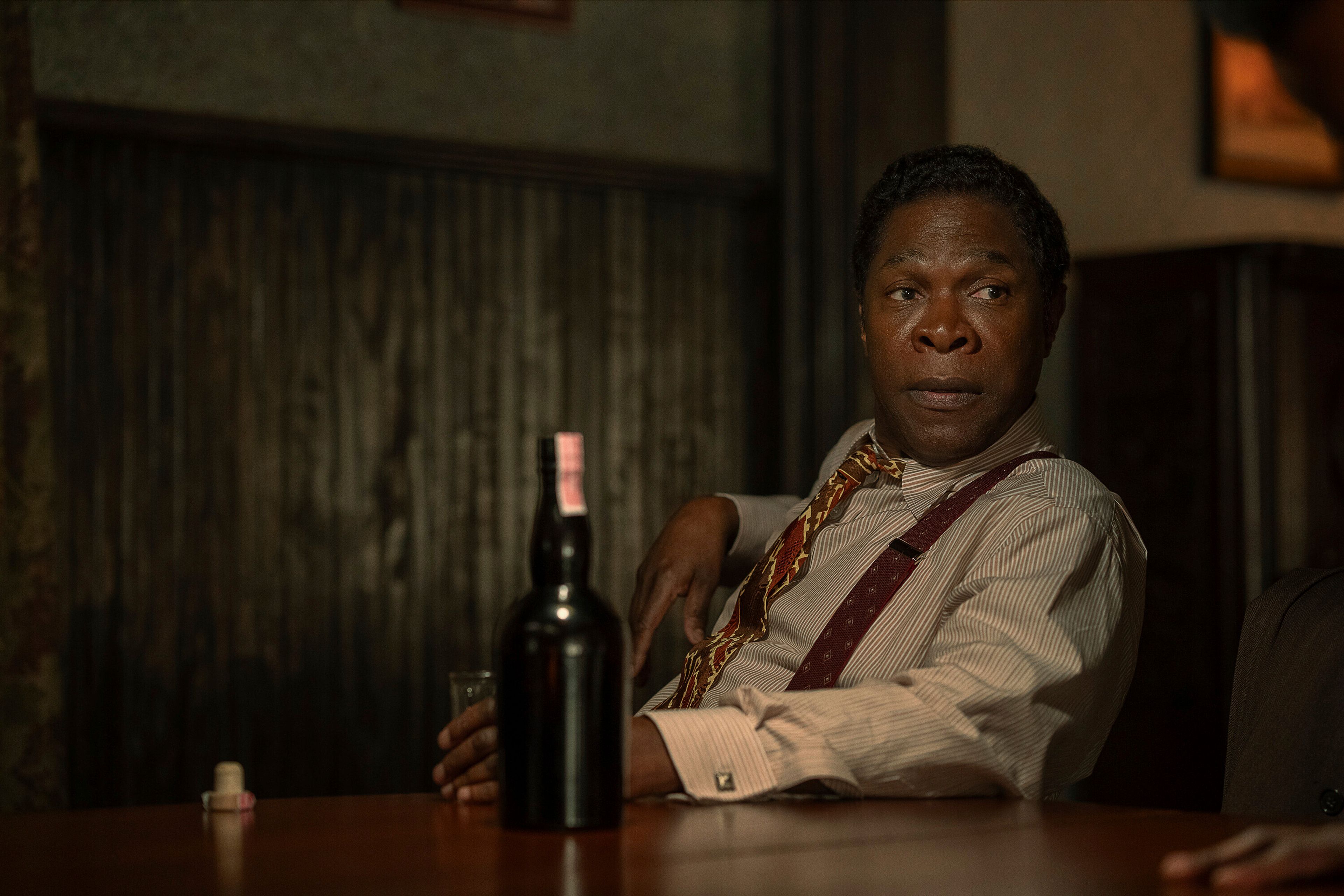 This image released by Netflix shows Michael Potts in a scene from "The Piano Lesson." (David Lee/Netflix via AP)