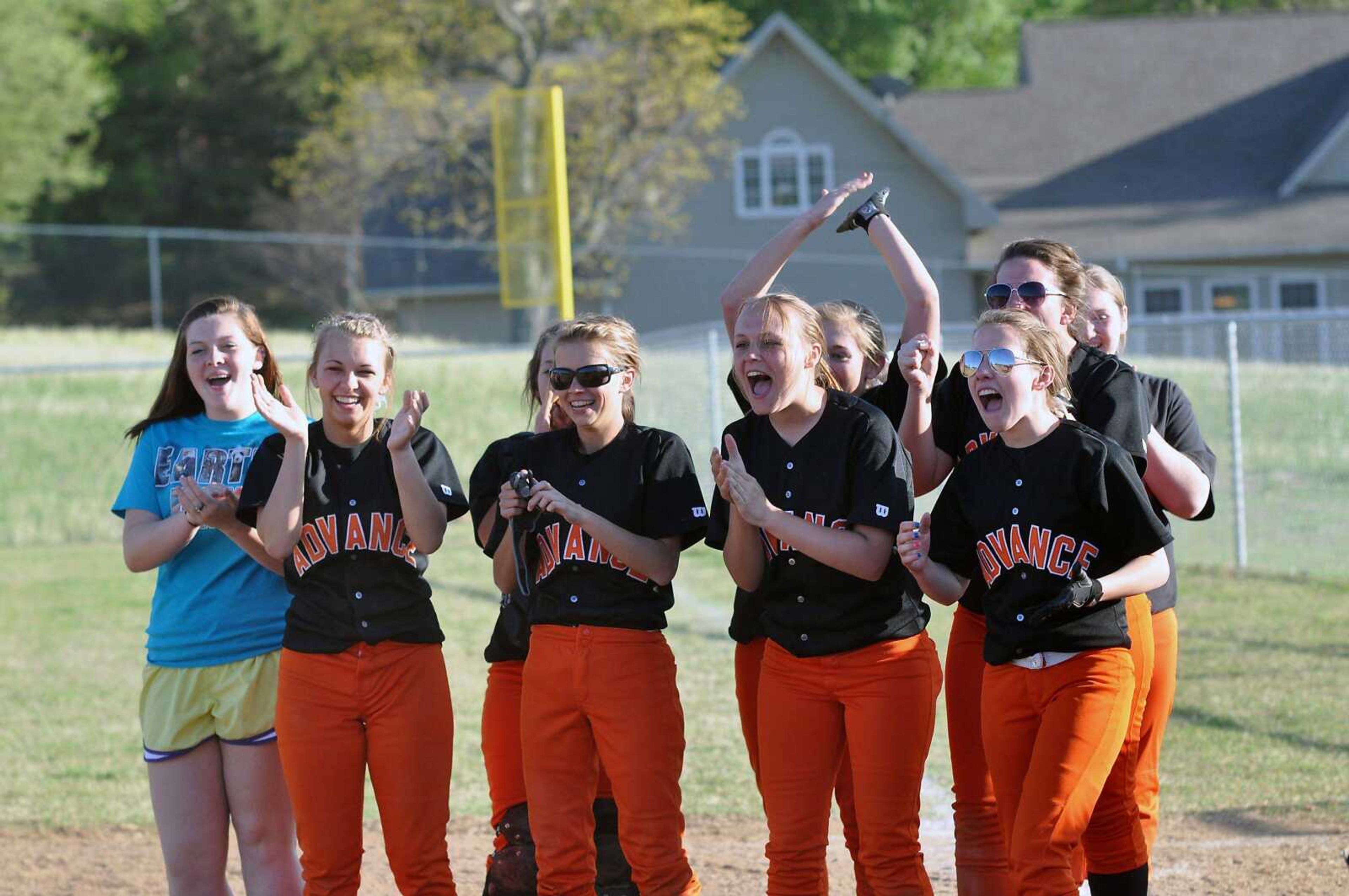 Advance players celebrate after defeating Woodland 9-1 in the championship game of the Stoddard County Activities Association tournament Tuesday in Puxico, Mo. (DUSTIN WARD ~ Daily Statesman)