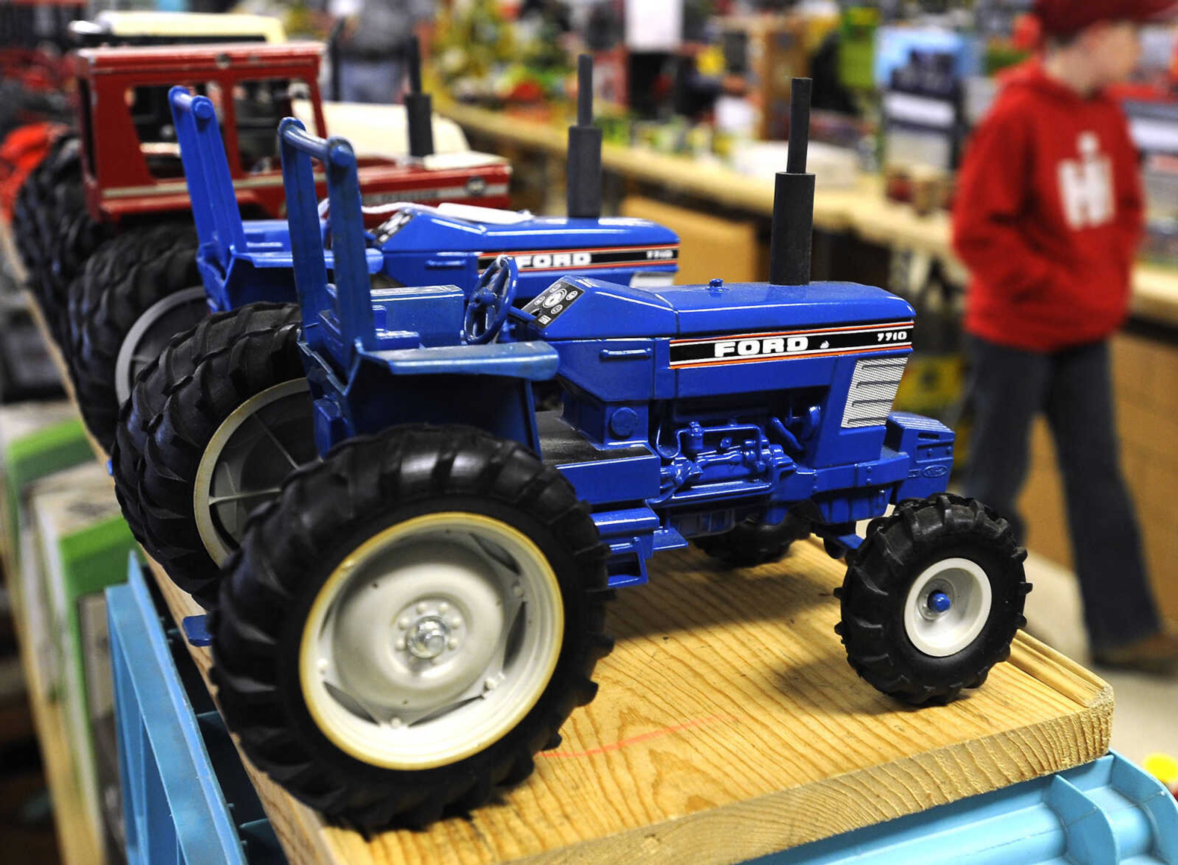 Toy tractors are on display at the Cousin Carl Farm Show on Saturday, March 12, 2016 at Arena Park.