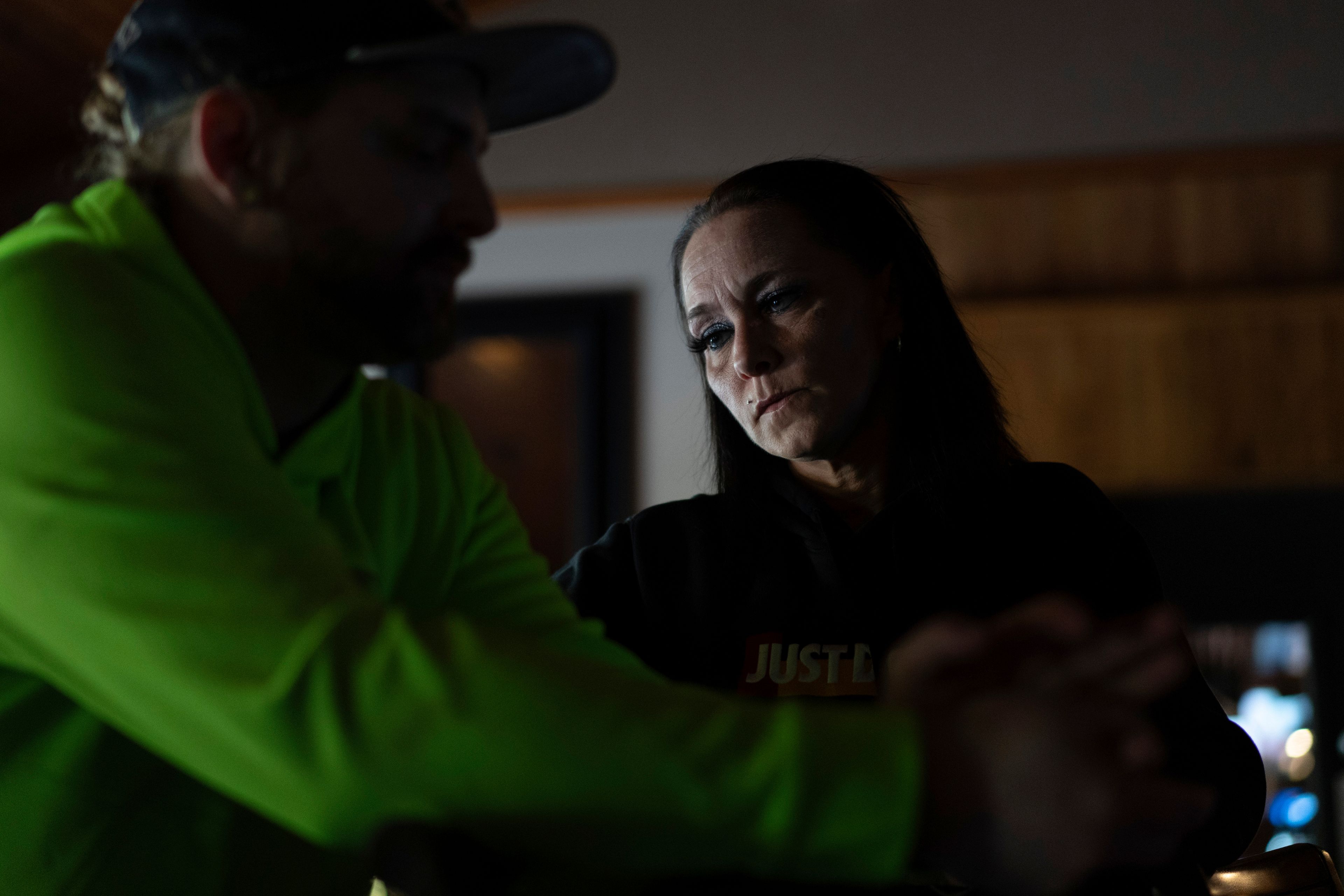 April Youst pauses as she talks with Aaron Parsons before starting work at a restaurant in West Virginia on Wednesday, Oct. 9, 2024. (AP Photo/Carolyn Kaster)