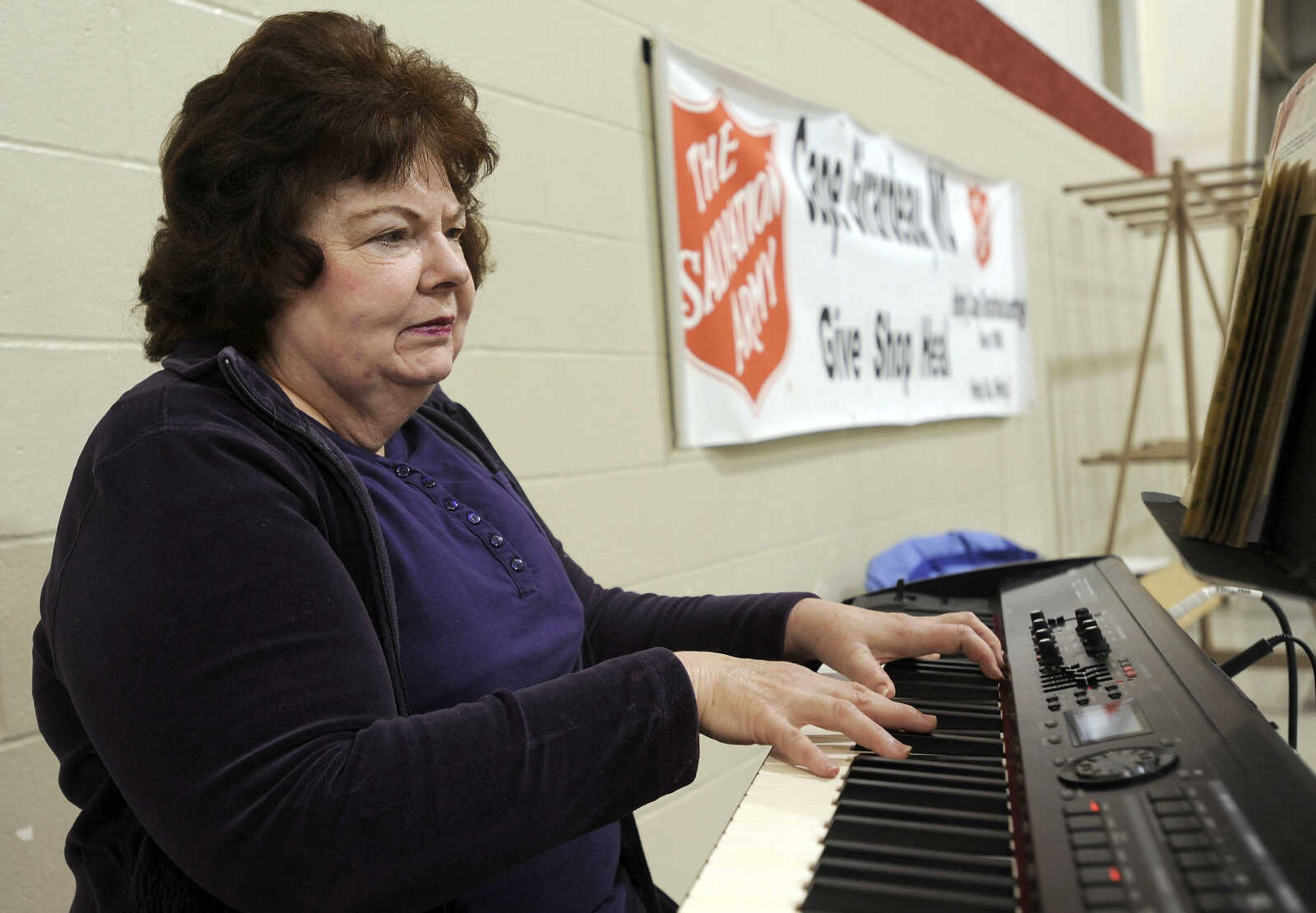 FRED LYNCH ~ flynch@semissourian.com
Nancy Nussbaum Robinson provides background music Thursday, Nov. 23, 2017 at the Thanksgiving Day luncheon at the Salvation Army in Cape Girardeau.