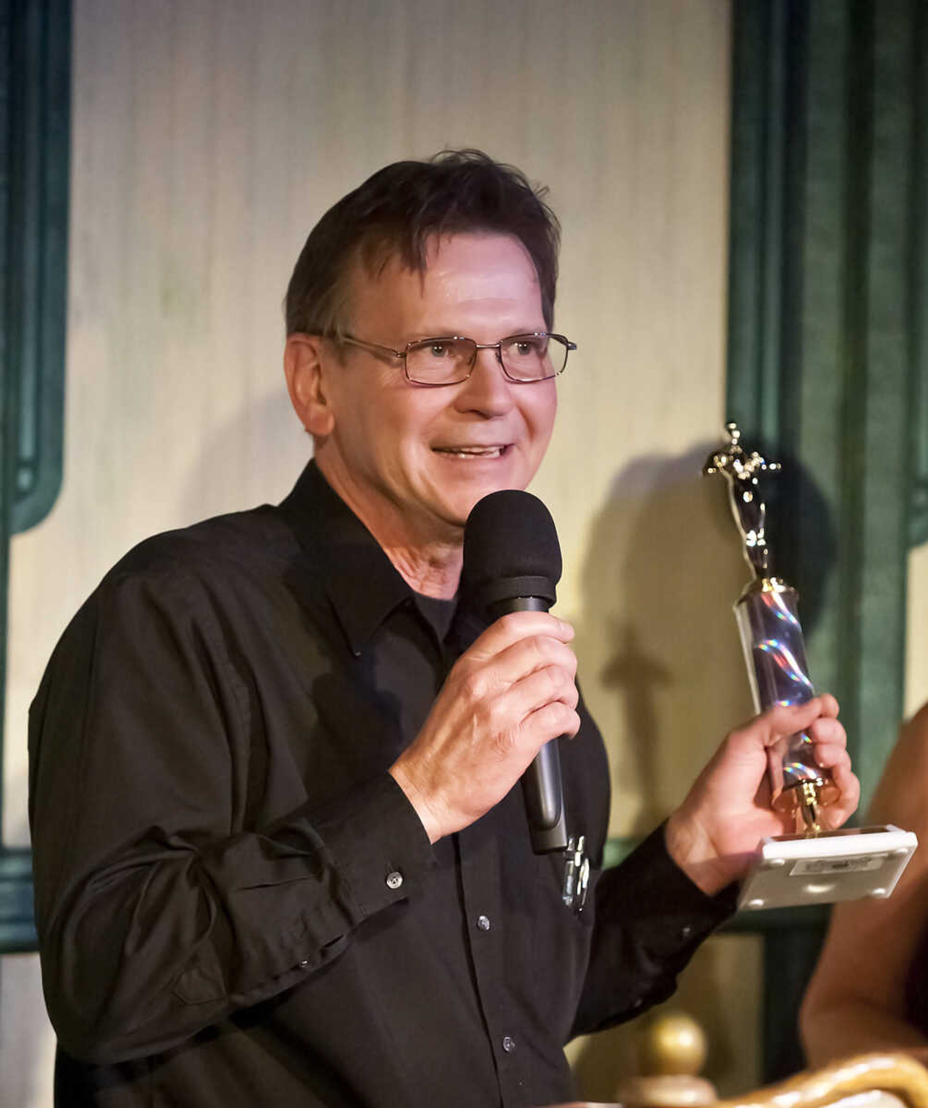 Bill Dunn speaks after being awarded theAbbott Award for best assistant director during the Abbott Awards, the River City Players' annual awards ceremony, Saturday, Jan. 18, at Port Cape in downtown Cape Girardeau. Auditions for the first production of the 2014 season, "Quiet on the Set," will be held at 7 p.m. Jan. 29 and 30 at Port Cape.