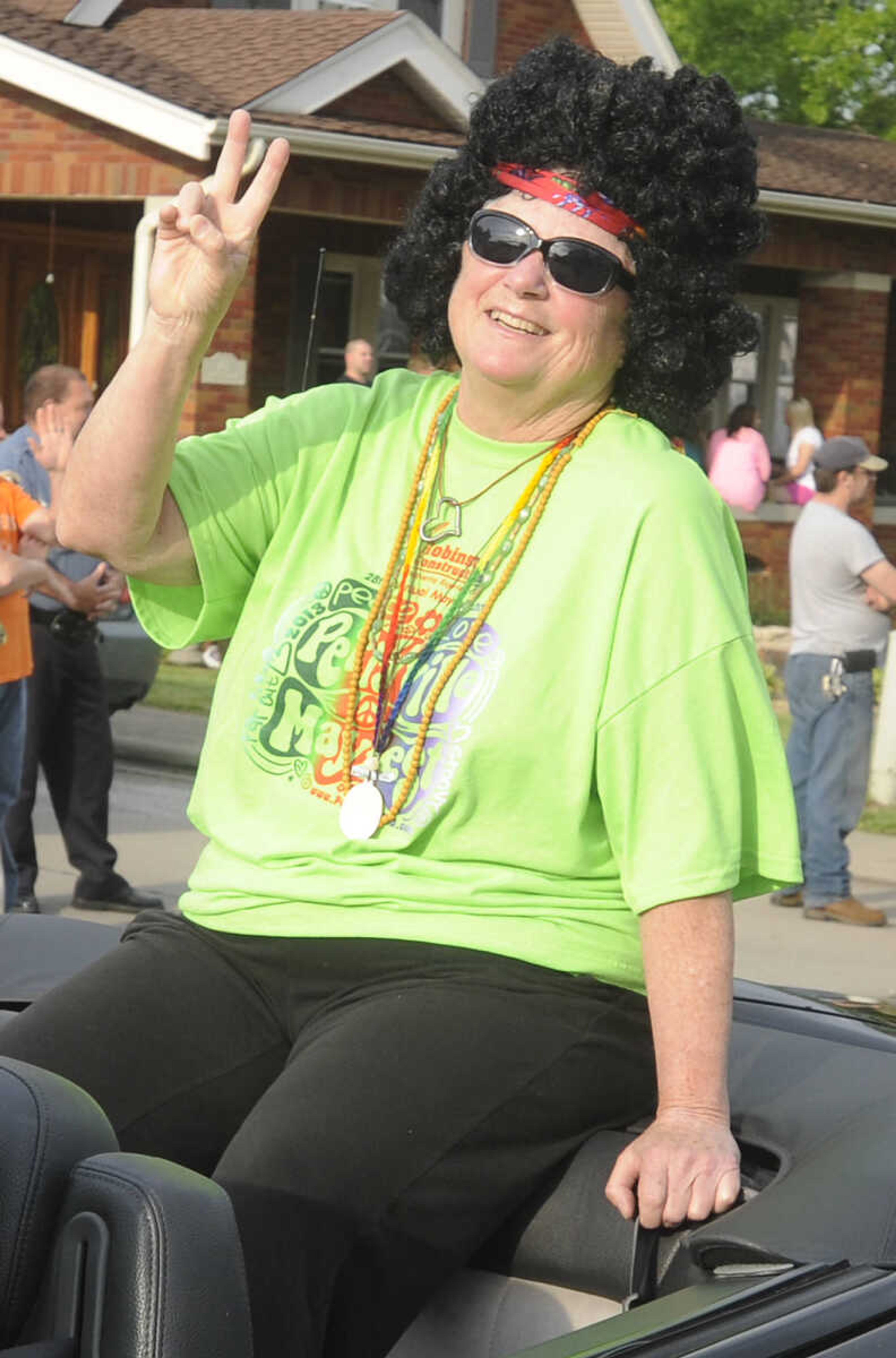 Perryville Mayor Debbie Gahan during the Perryville Mayfest Parade Friday, May 10, in Perryville, Mo. This year's Mayfest theme is Peace, Love, Perryville Mayfest.