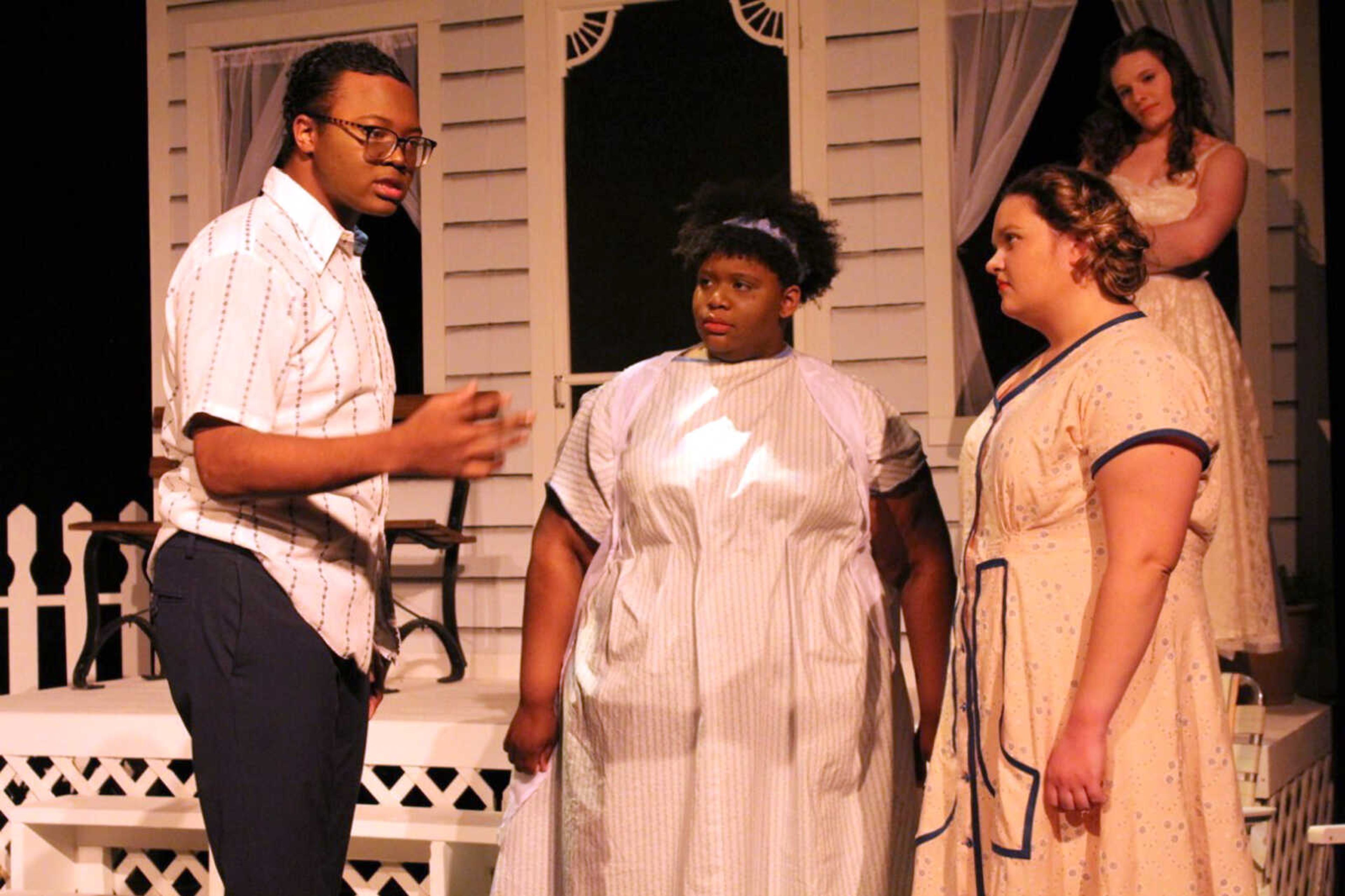 From left, Southeast Missouri State University freshman Romell Johnson, sophomore Kennedee Nash, senior Kirsten Freimann and senior Jessica Knight rehearse a scene from "Picnic" by William Inge. The play will open Thursday, April 27, in Bedell Performance Hall at SEMO's River Campus in Cape Girardeau.