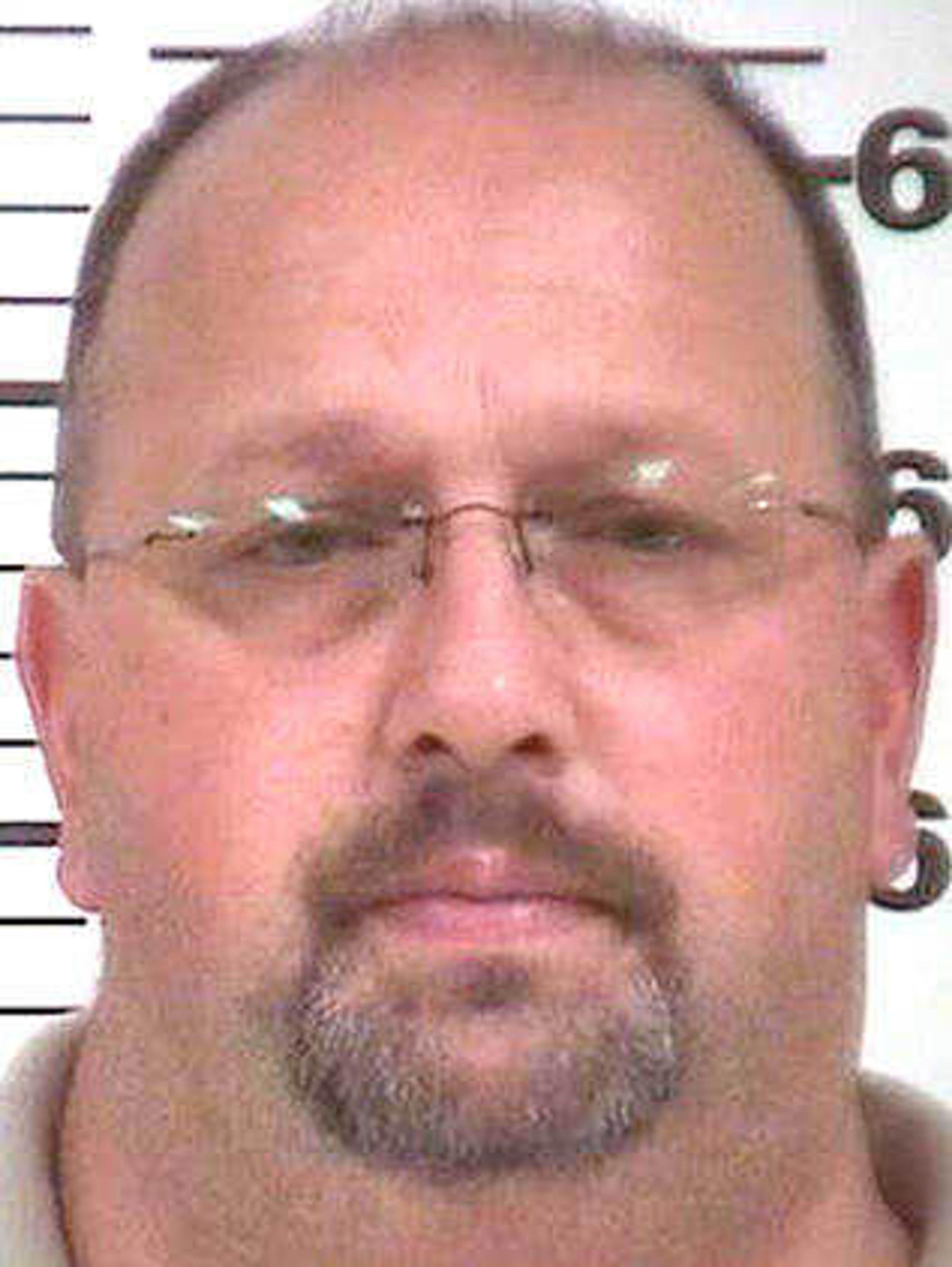 In this undated booking photo released by Platte County, Missouri prosecutor's office, Darren Paden is seen. Platte County prosecuting attorney Eric Zahnd issued a news release last week listing the names and occupations of 16 people in Dearborn who had either written letters or testified on behalf of 52-year-old Darren Paden, who was sentenced Oct. 30 to 50 years in prison for statutory sodomy. Paden's defense attorney says Zahnd's actions against those who wrote letters will have a chilling effect on others who want to vouch for a friend or family member who commits a crime. (Platte County Prosecutor's Office via AP)