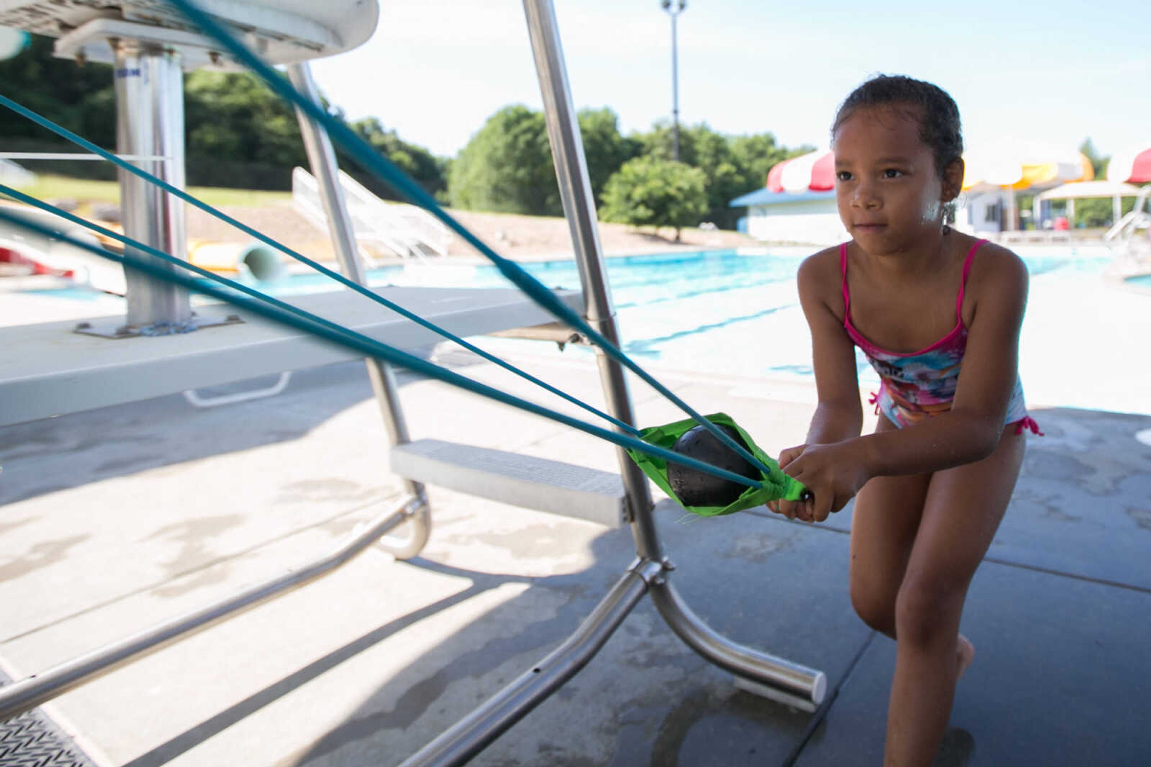 GLENN LANDBERG ~ glandberg@semissourian.com

Jaymyia Ivory launches a water balloon at a target during the Mermaid and Pirate Party at Cape Splash Saturday, June 18, 2016 in Cape Girardeau.