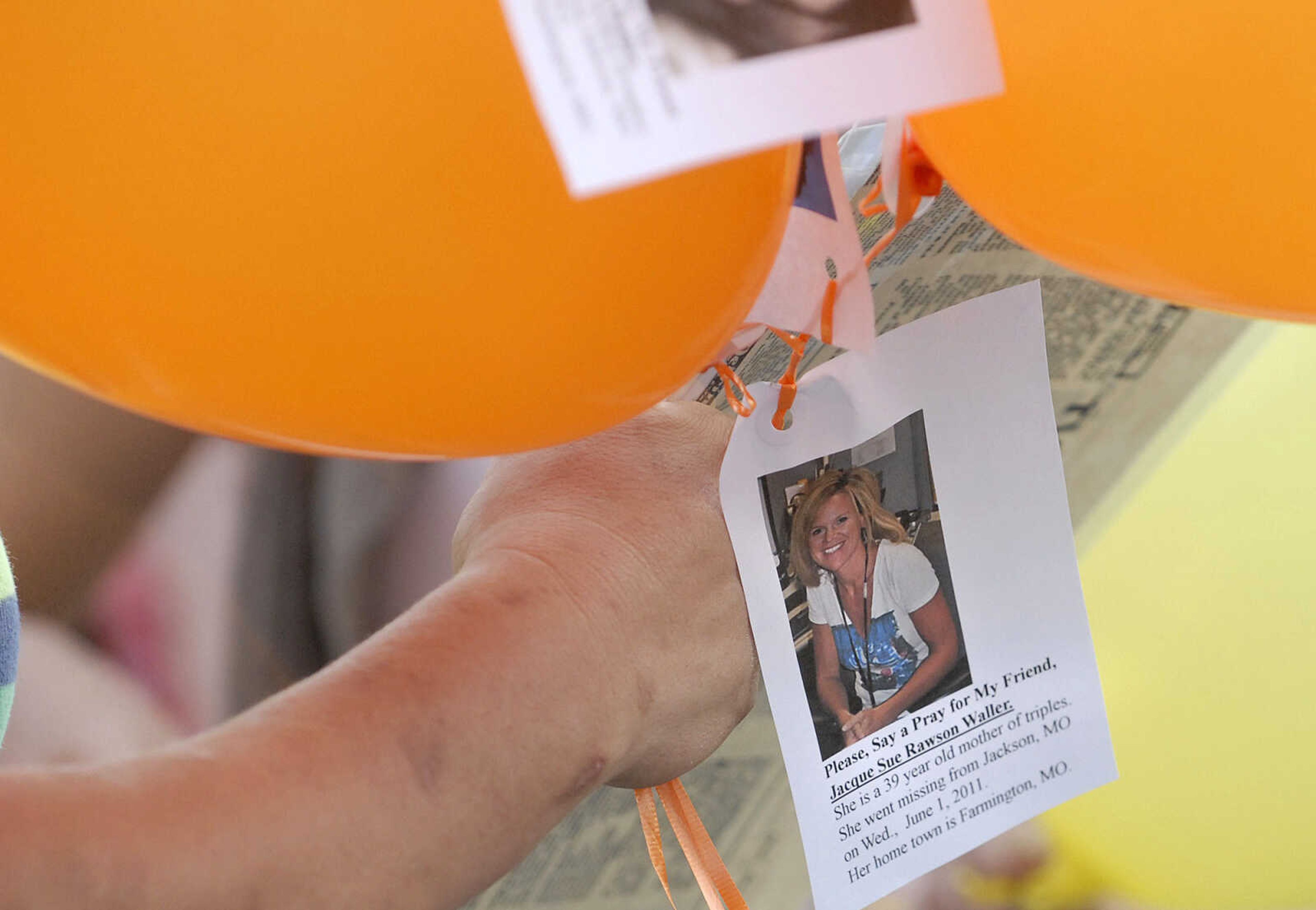 LAURA SIMON~lsimon@semissourian.com
Flyers for Jacque Sue Waller were attached to balloons to be released Thursday, June 9, 2011 during a prayer service for Waller at Farmington High School. Waller, a 39-year-old mother of three, has been missing since June 1, 2011.