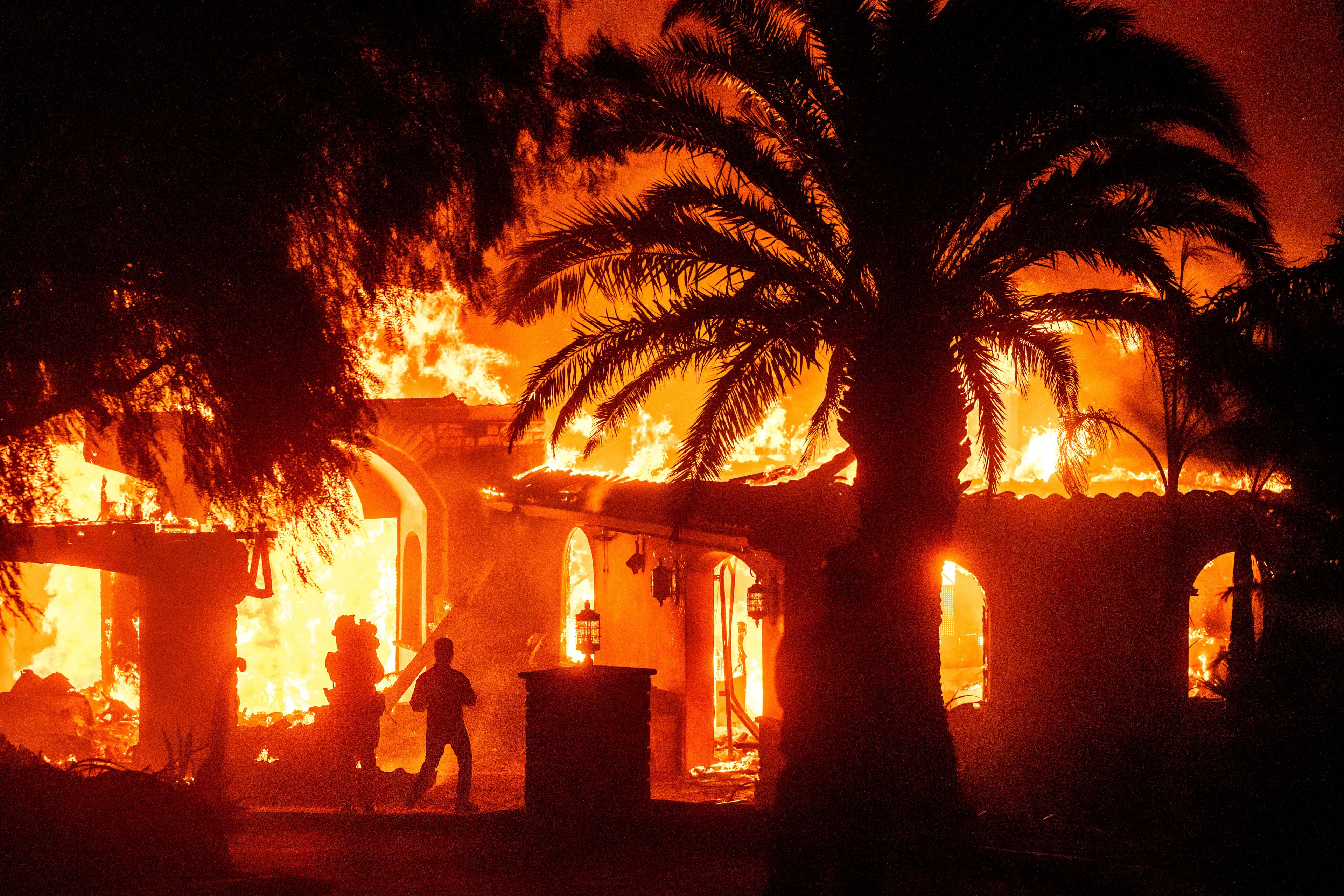 Wild winds fuel Southern California wildfire that has forced thousands to evacuate