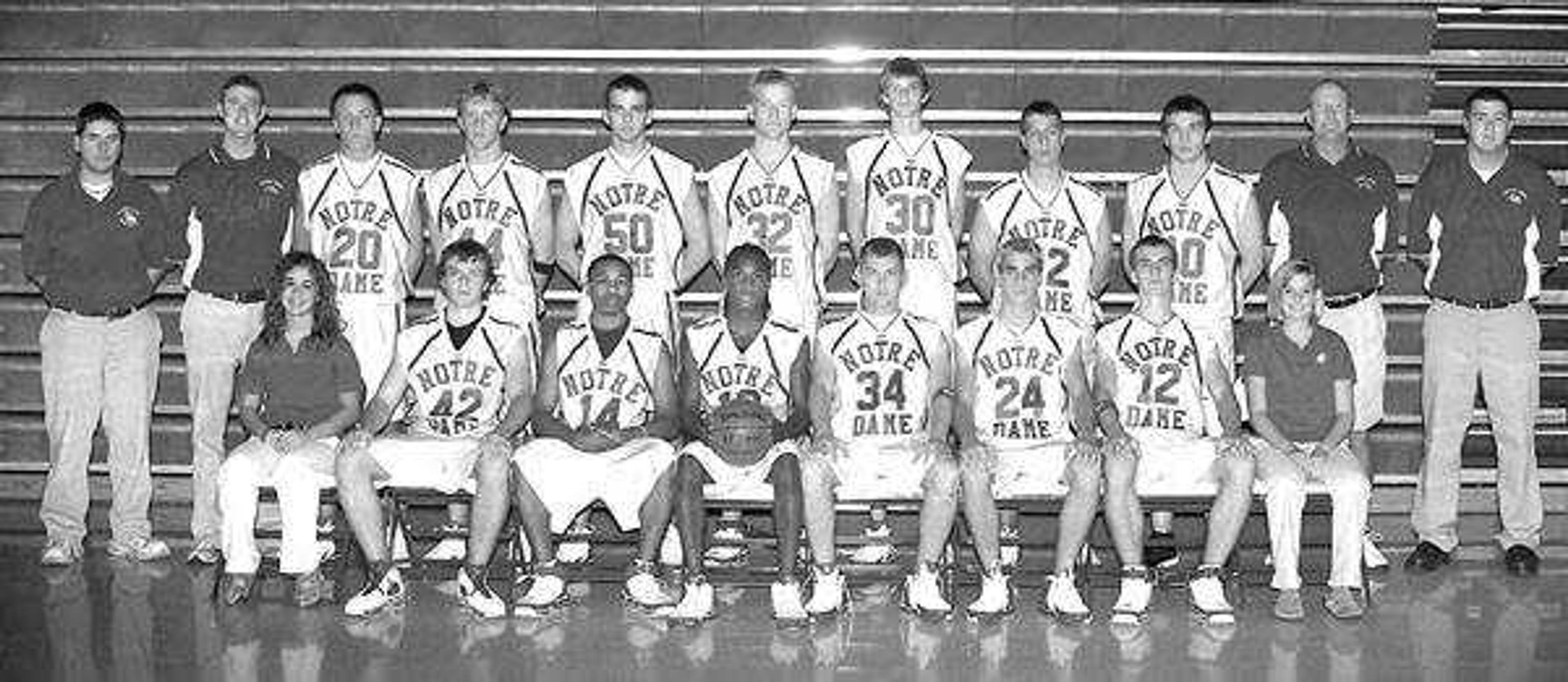 Members of the Notre Dame boys basketball team, from left: Front -- manager Madelyn Ressel, Brandon Holzum, Xavier Delph, Frankie Ellis, Jacob Essner, Kirk Boeller, Abe Dirnberger, manager Allie Bryant; Back -- manager Jacob Loveless, assistant coach Kevin Roberts, Mark Himmelberg, Lucas Dirnberger, Logan Haines, Alex Ressel, Ryan Willen, Chad Friend, Jay Simmons, head coach Paul Hale and assistant coach Josh Sparkman.