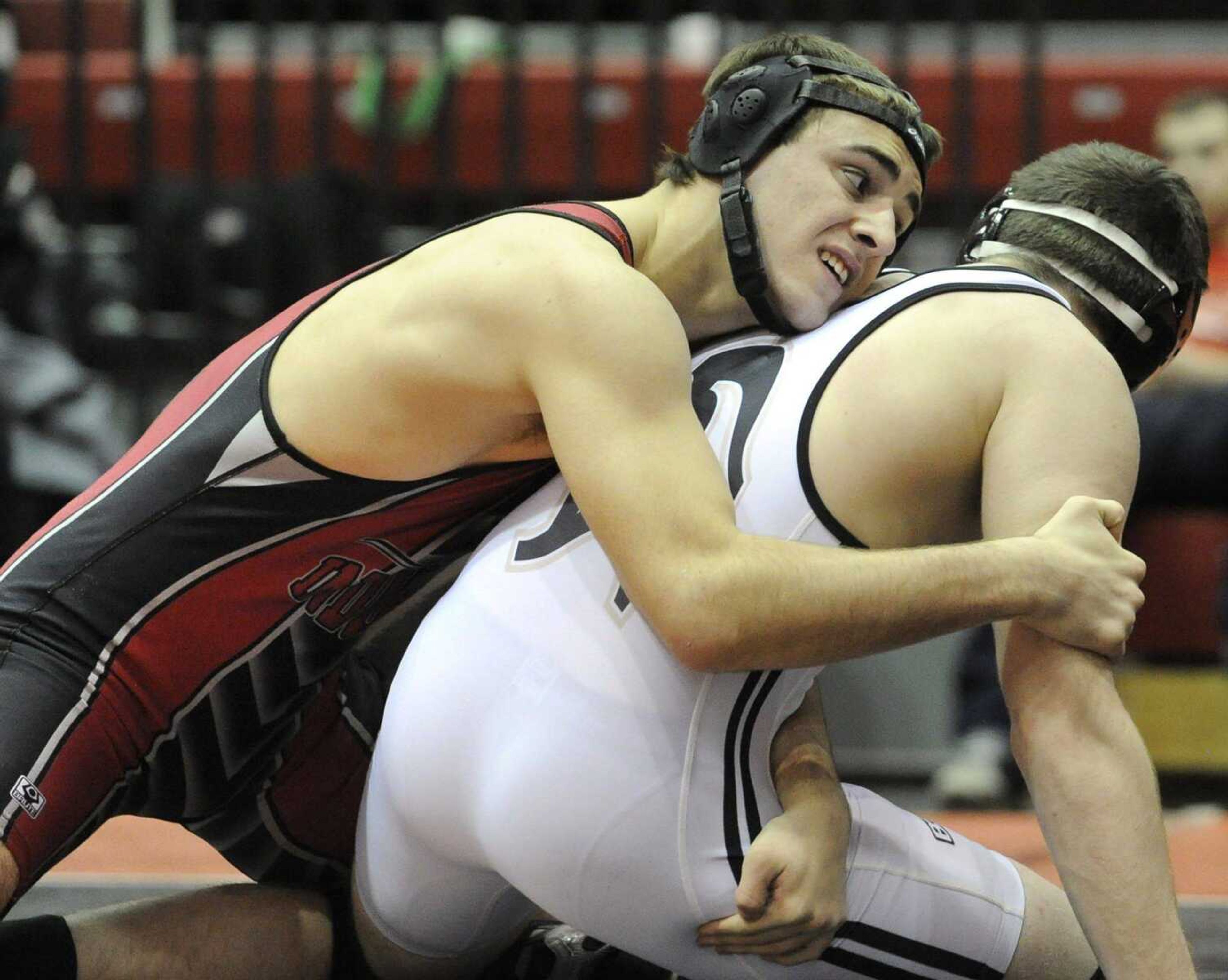 Jackson's Ben Rushin wrestles Farmington's Austin Dussold in the 195-pound championship match of the SEMO Conference tournament Saturday, Jan. 21, 2012 in Jackson. Rushin won the match. (Fred Lynch)