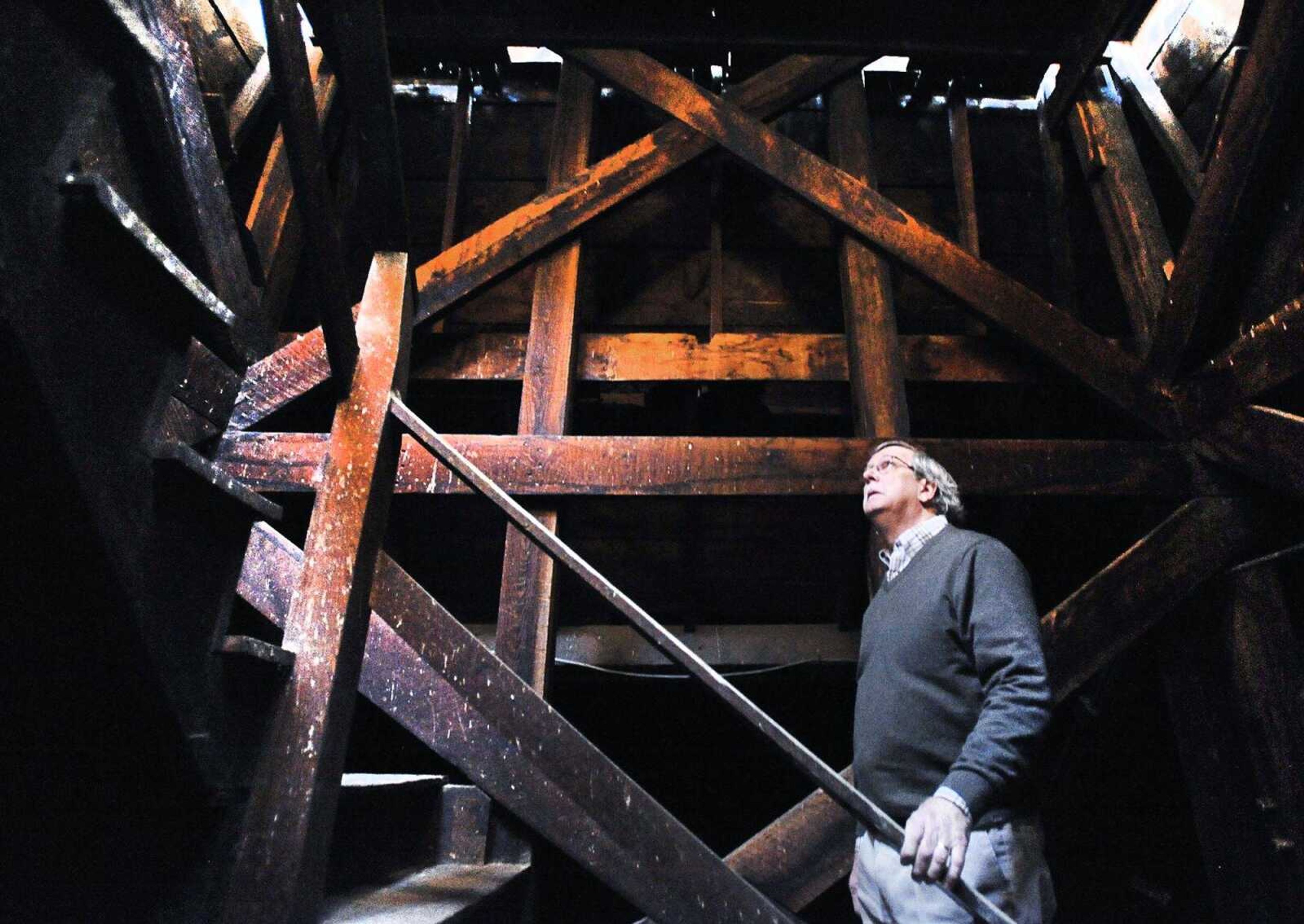 Judge Benjamin Lewis gazes up into the belly of the Common Pleas Courthouse cupola Wednesday in Cape Girardeau. Cape Girardeau County is considering moving court services out of the 160-year-old building. More images may be seen in a gallery at semissourian.com. (Laura Simon)