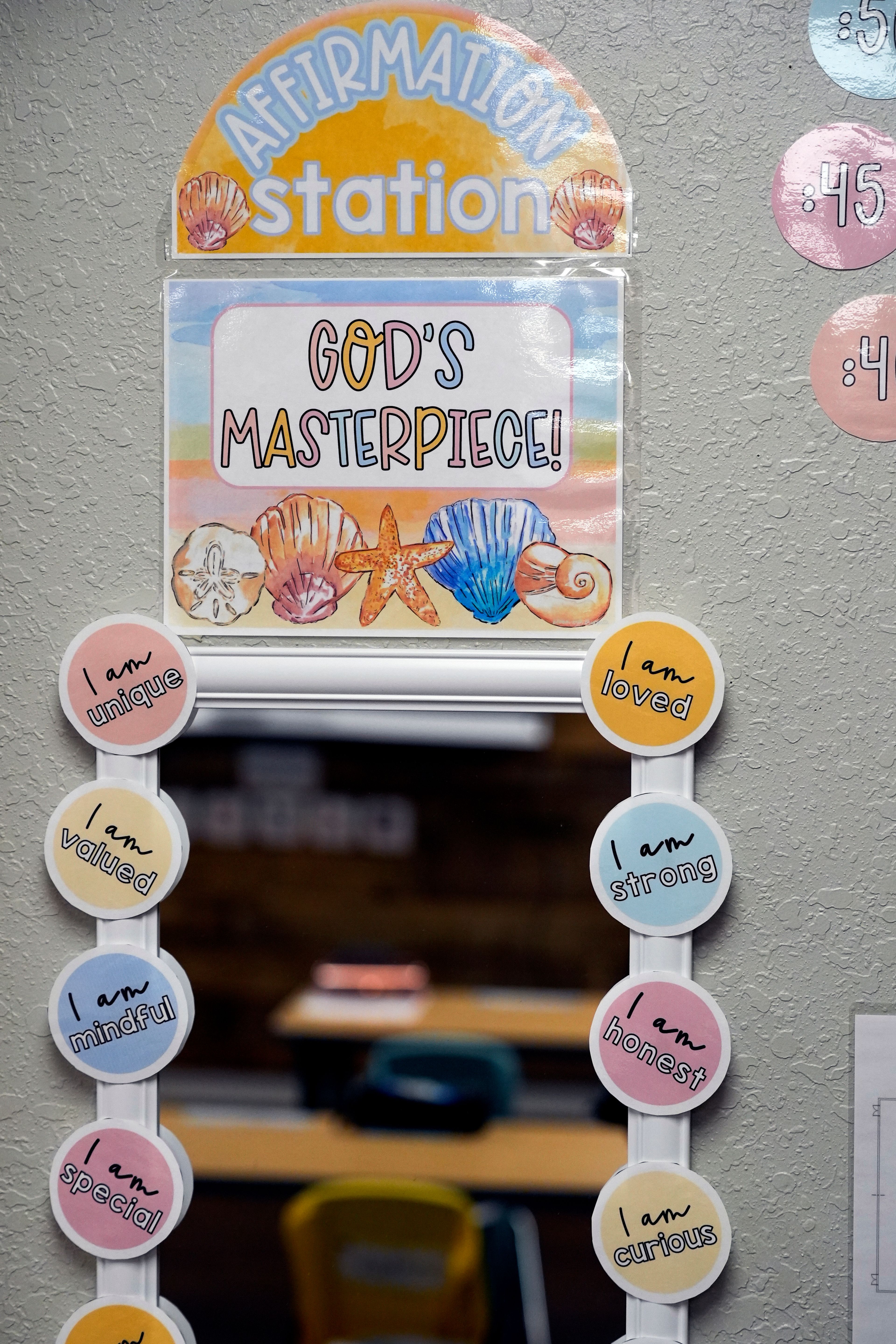 A mirror with a lesson to show students affirmation is seen in a fourth grade classroom at the Winter Garden Christian Academy Thursday, Aug. 29, 2024, in Winter Garden, Fla. (AP Photo/John Raoux)