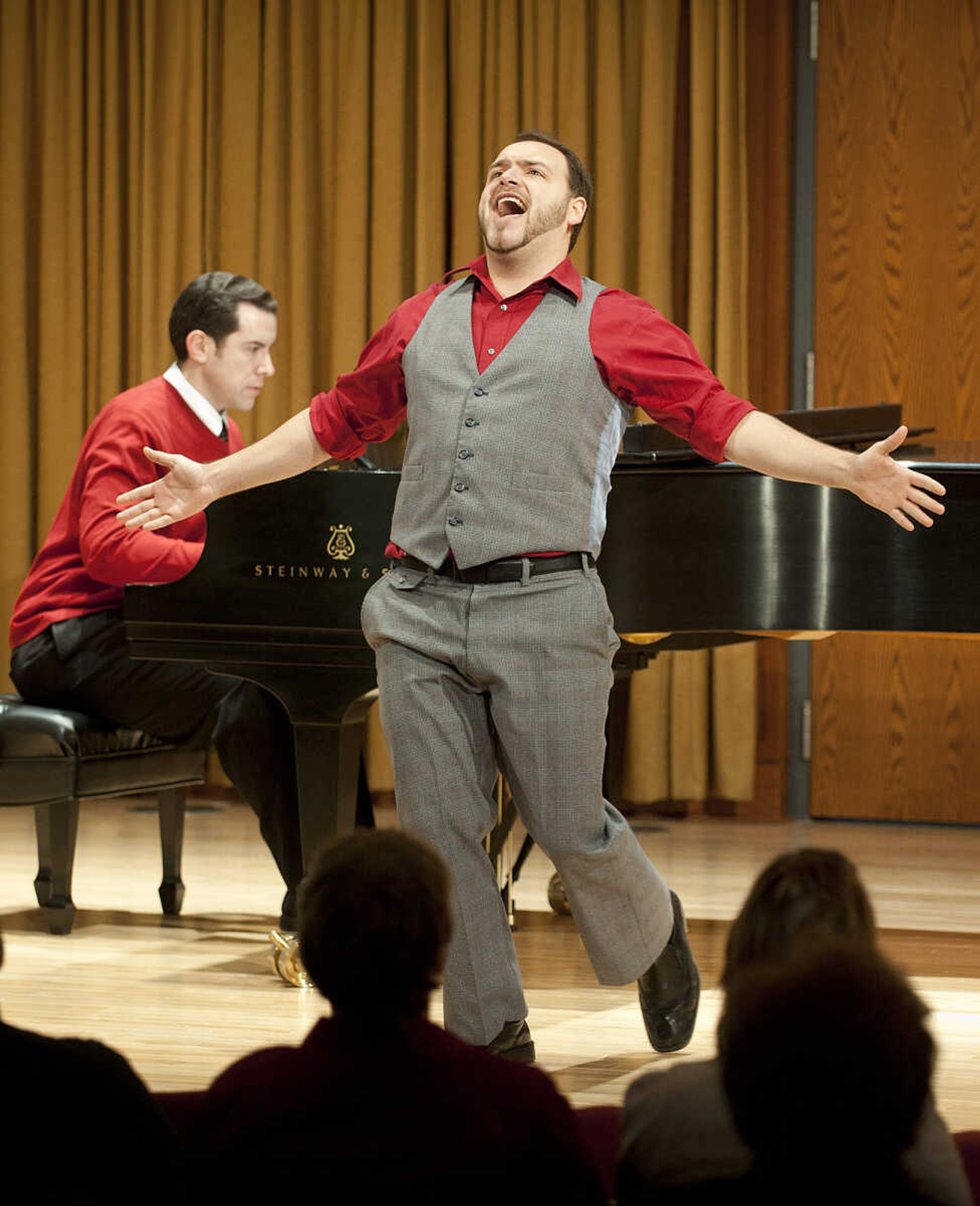 Southeast Missouri State University student Kyle Morr, right, is accompanied on piano by musical theatre instructor Joe Mason as he sings "Those Were the Good Ol' Days," from the musical "Damn Yankees," during the Class Voice III Recital Sunday, Dec. 15, at the Shuck Recital Hall. Fifteen Southeast students performed during the annual recital which is in its sixth year.