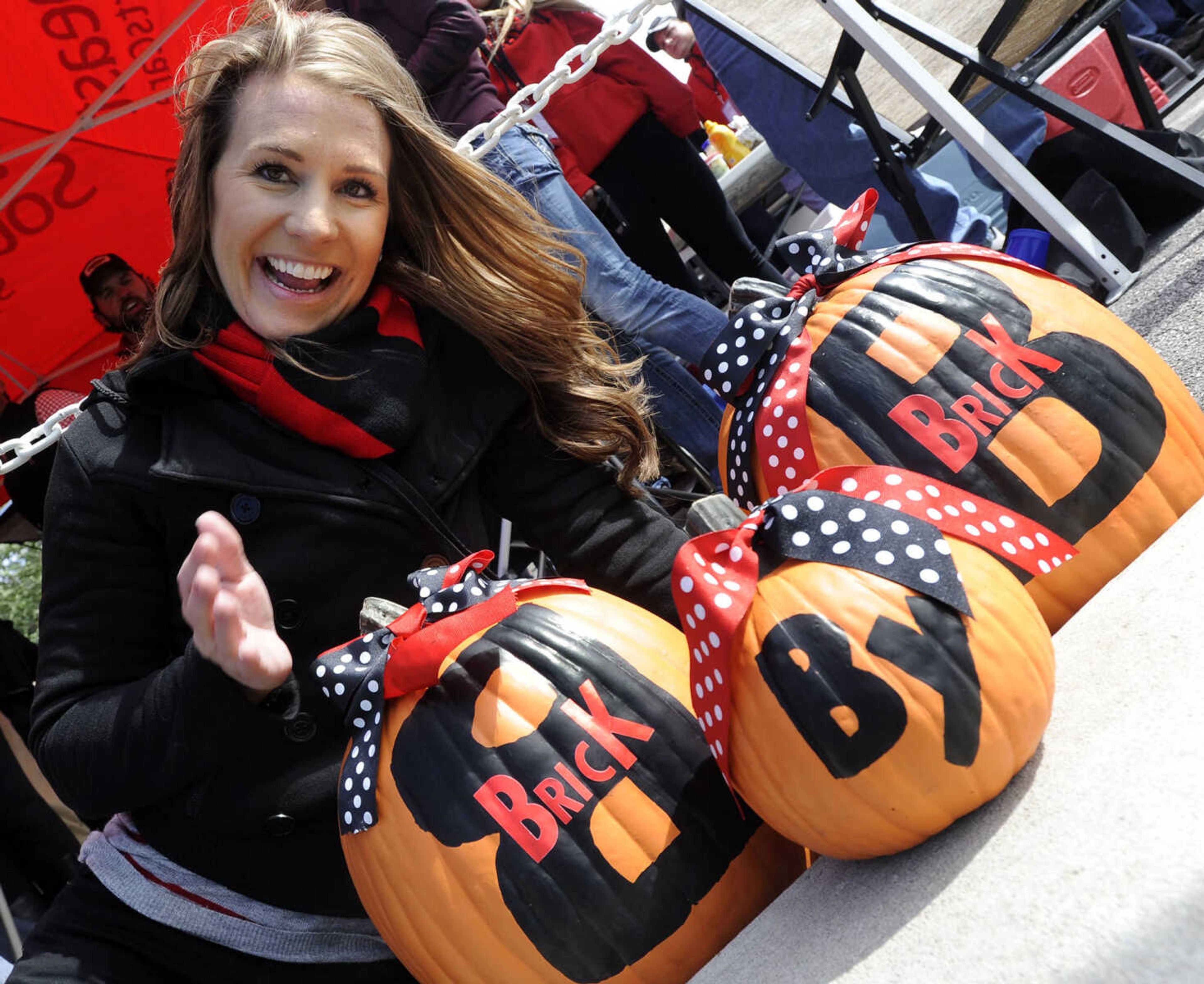 FRED LYNCH ~ flynch@semissourian.com
Legan Moore displays her pumpkin art at the homecoming game for Southeast Missouri State University on Saturday, Oct. 4, 2014 at Houck Stadium.