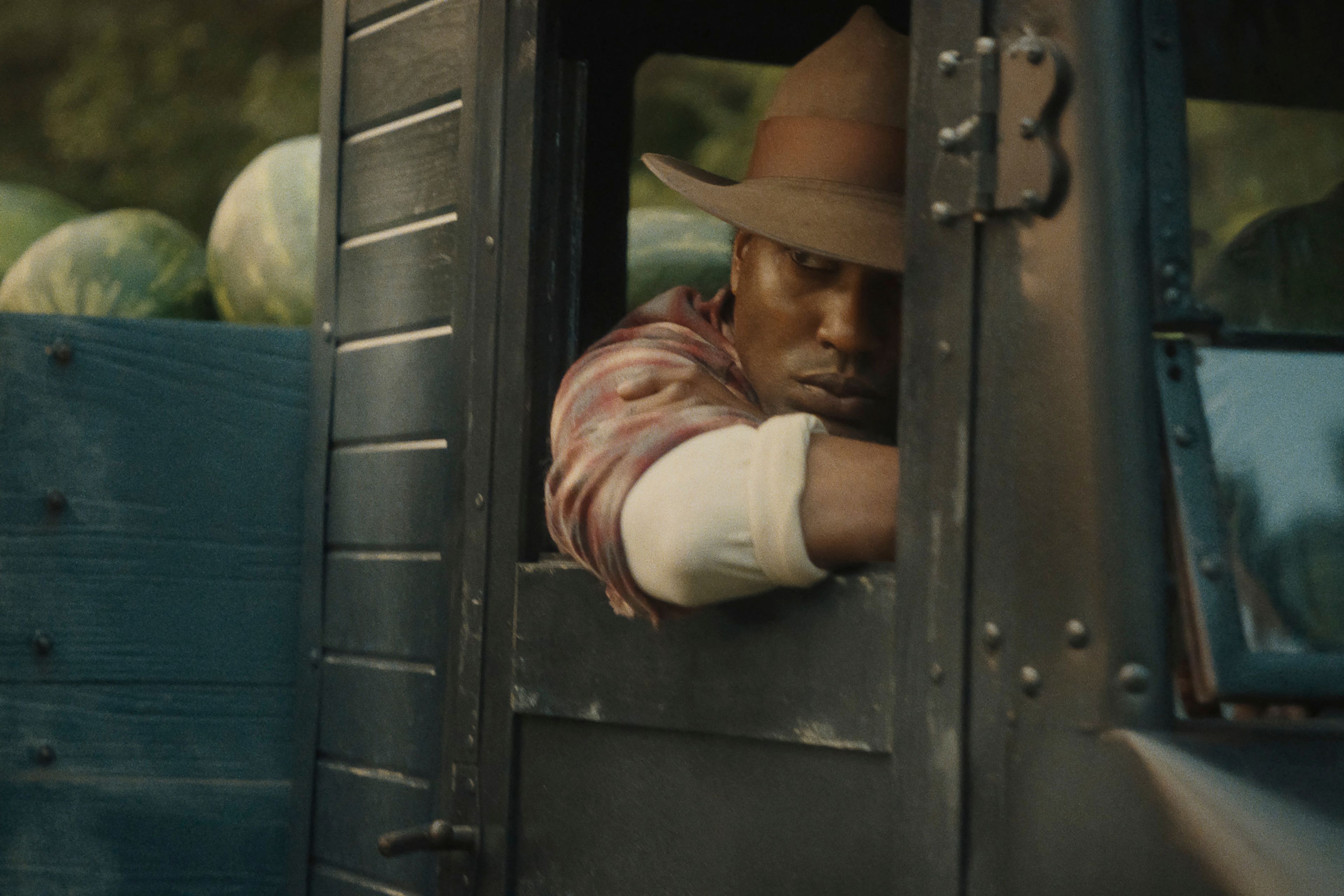 This image released by Netflix shows John David Washington in a scene from "The Piano Lesson." (Netflix via AP)