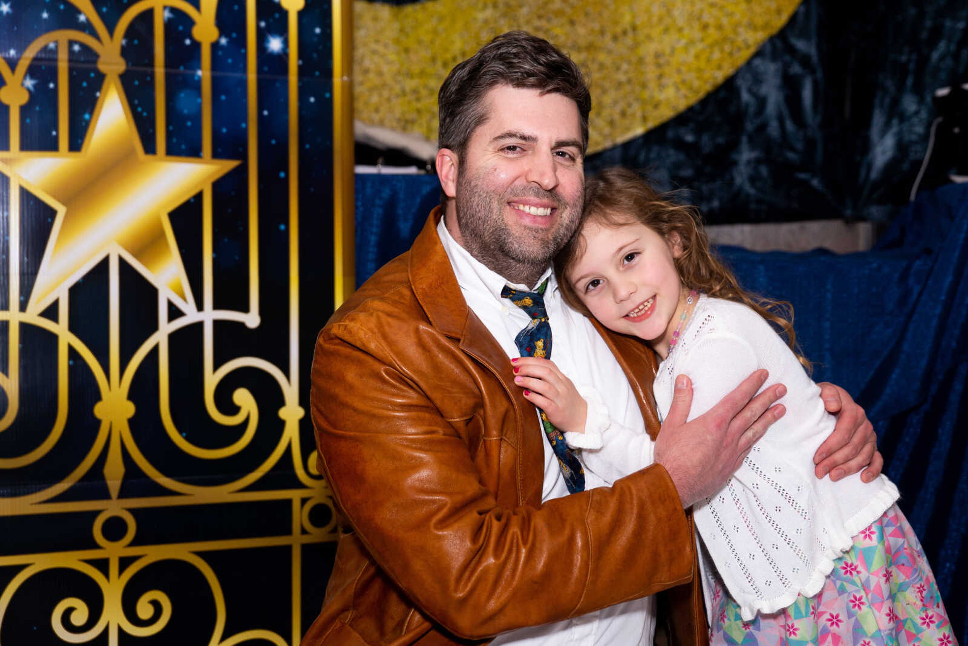 Matt Hileman poses with his daughter Vera, 6, on her birthday, Saturday, Feb. 18 at the father daughter dance.