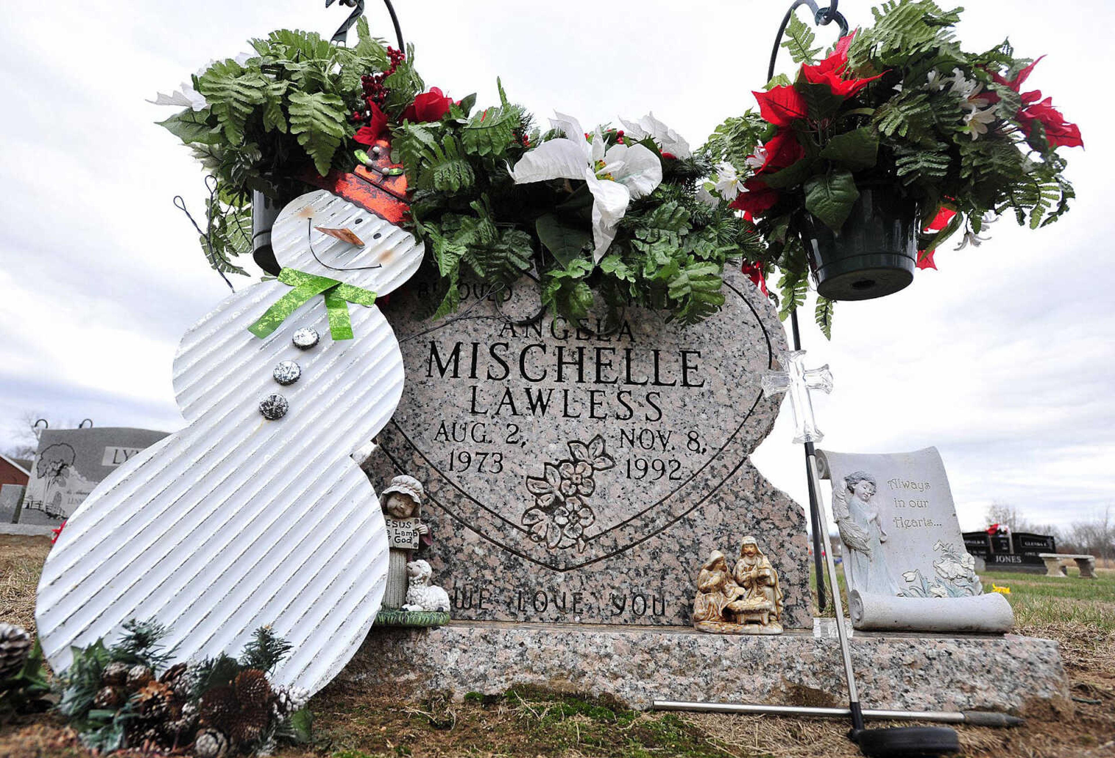 The gravesite of Angela Mischelle Lawless is seen Dec. 28 at Unity Cemetery in Benton, Missouri.