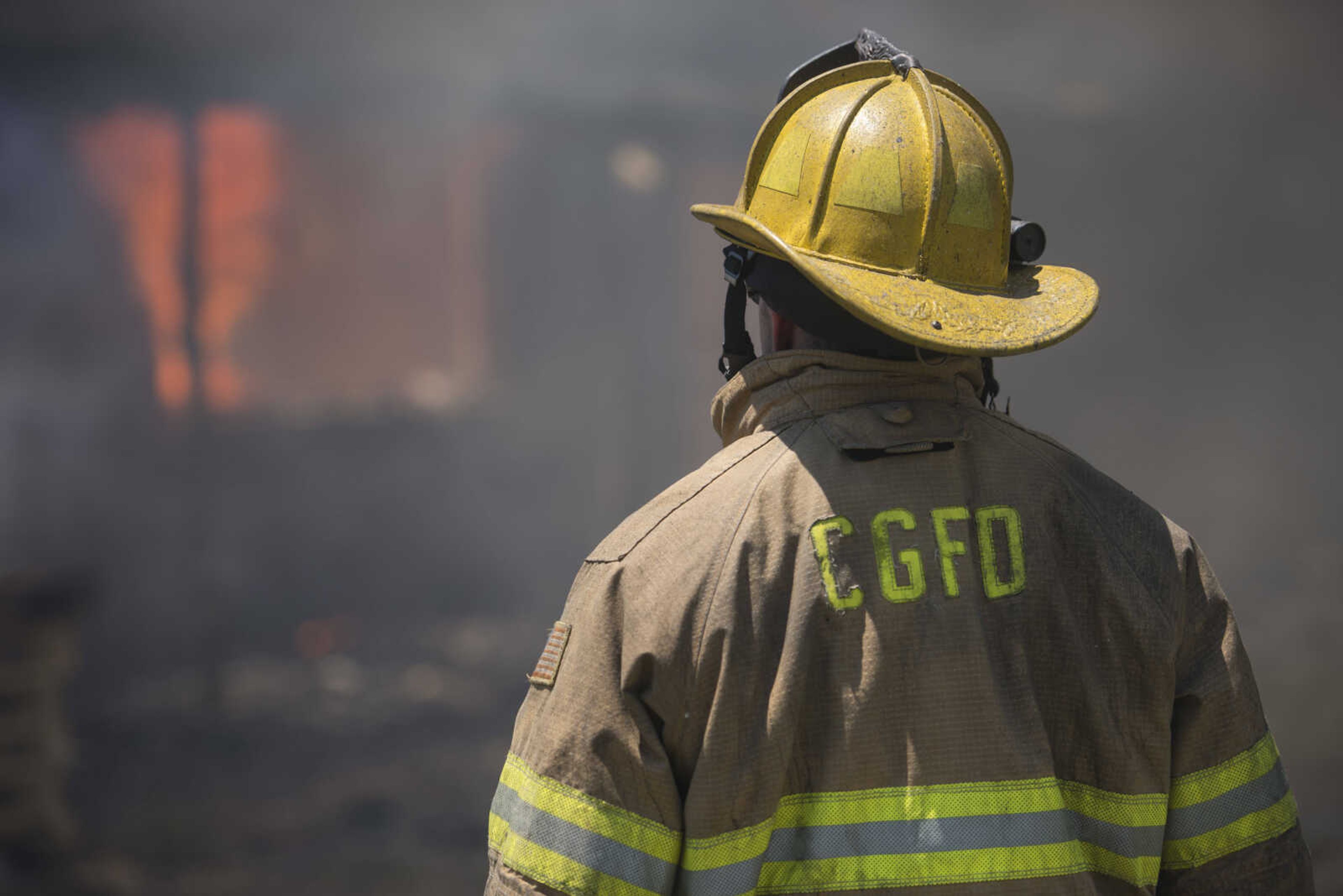 A Cape Girardeau firefighter watches live-fire training June 10, 2017 in Cape Girardeau.