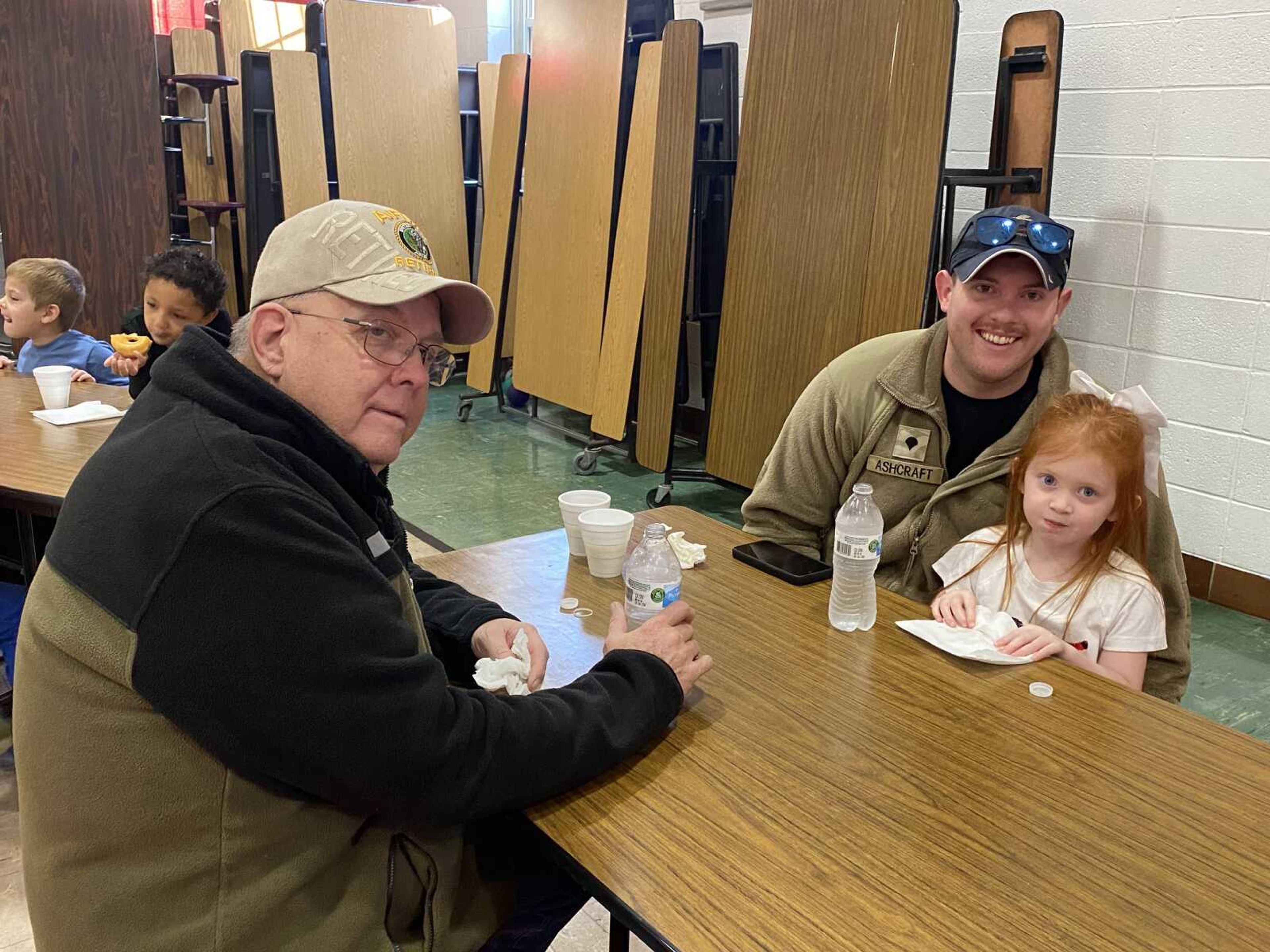 Pictured are Jimmie Allen (Grandpa) who served in the U.S. Army, Cody Ashcraft (dad) who served in the U.S. Army National Guard, and Hallie Ashcraft (daughter and granddaughter)  a pre-k student.