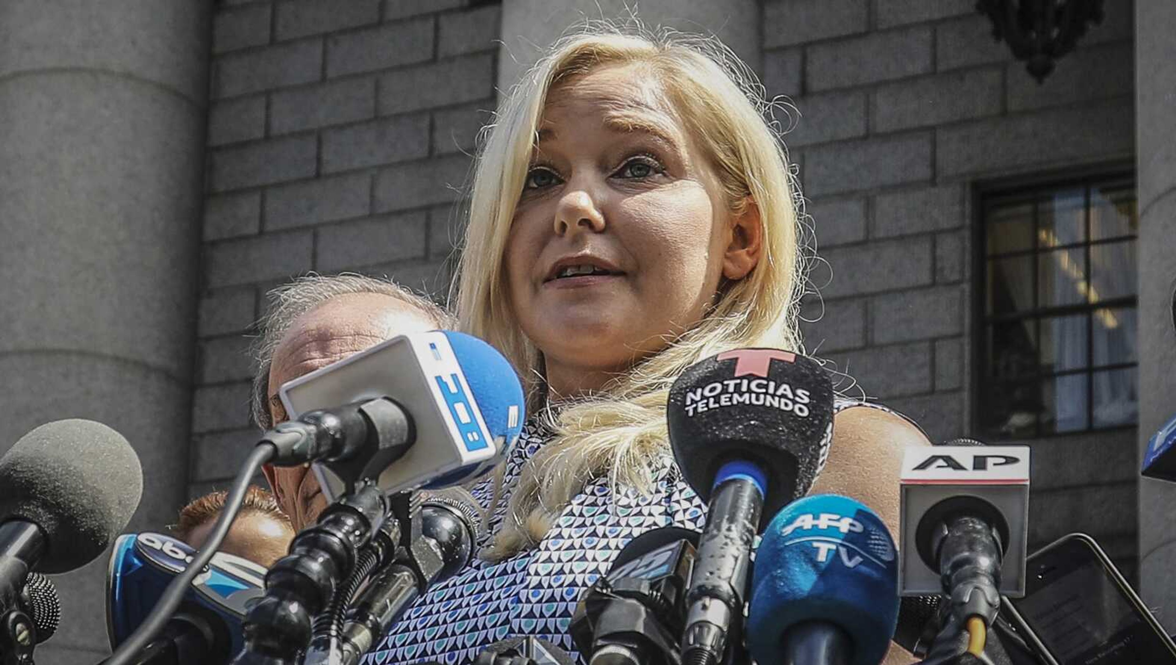 Virginia Roberts Giuffre holds a news conference outside a Manhattan court following the jailhouse death of Jeffrey Epstein, Aug. 27, 2019, in New York.