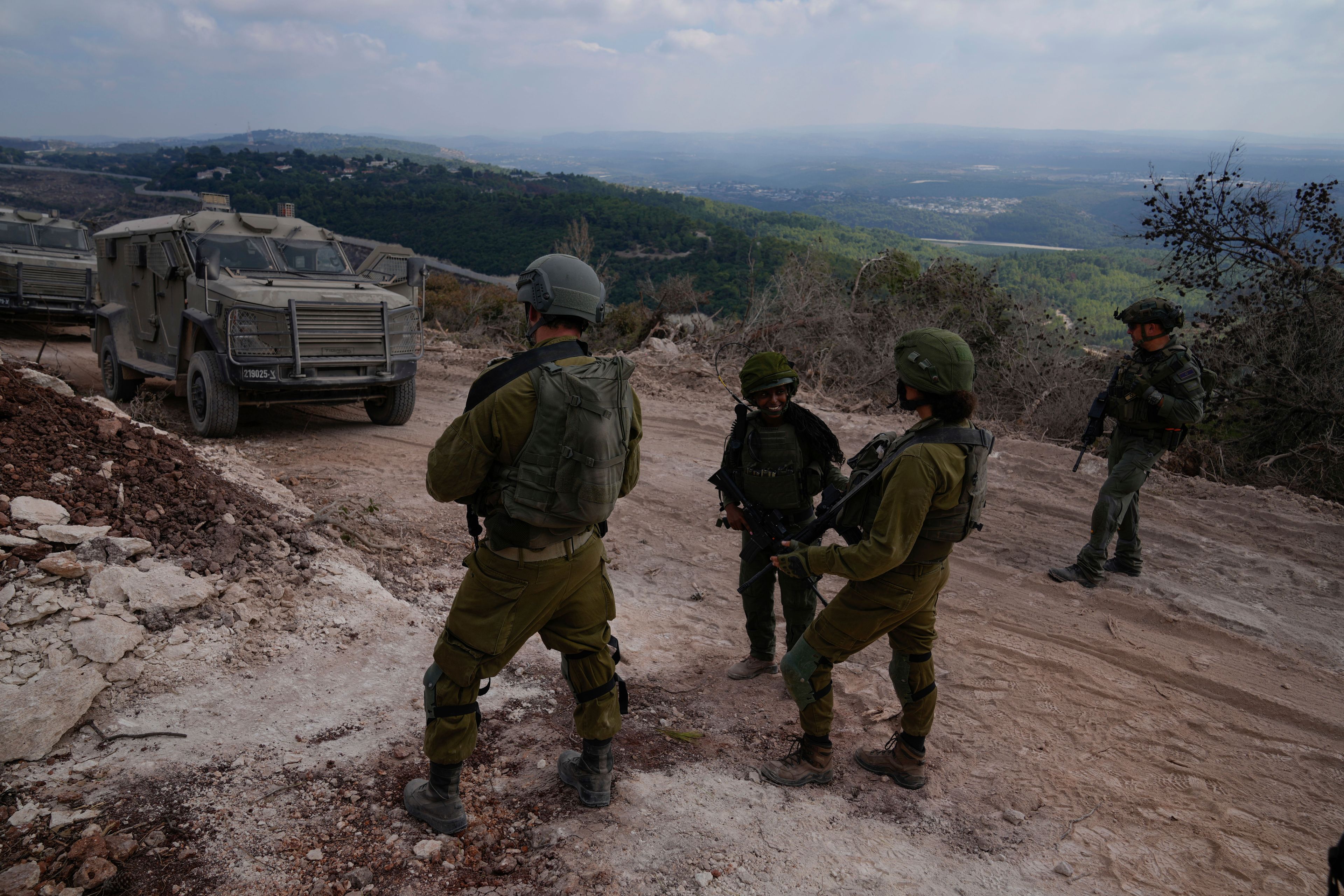 Israeli soldiers are seen during a ground operation in southern Lebanon, near the border with Israel, Sunday, Oct. 13, 2024. (AP Photo/Sam McNeil)