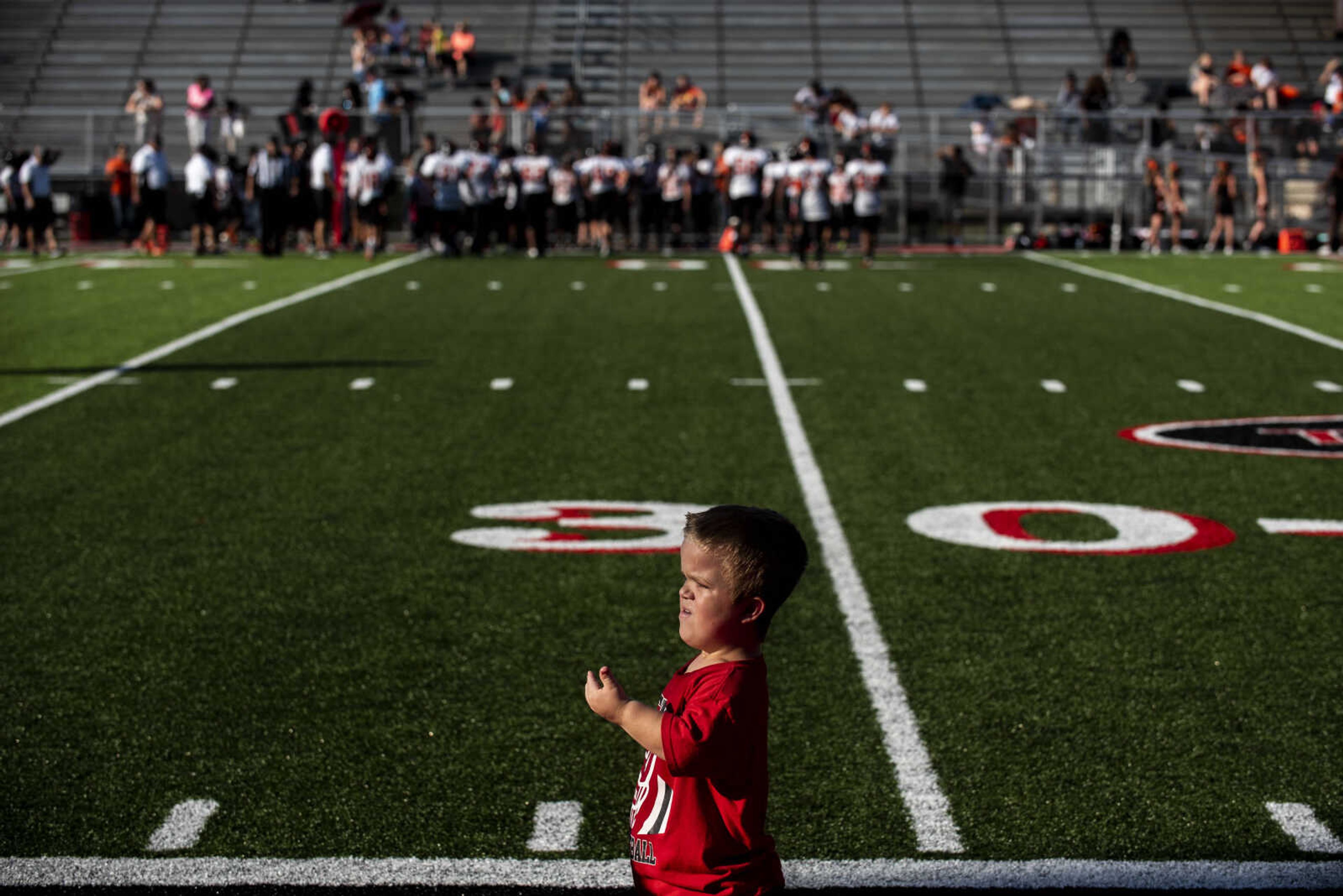 Izaac Pursley motions for a player to come towards him at the 30 yard line during a Jackson Junior High football game against Cape Central Sept. 13, 2018, in Jackson.