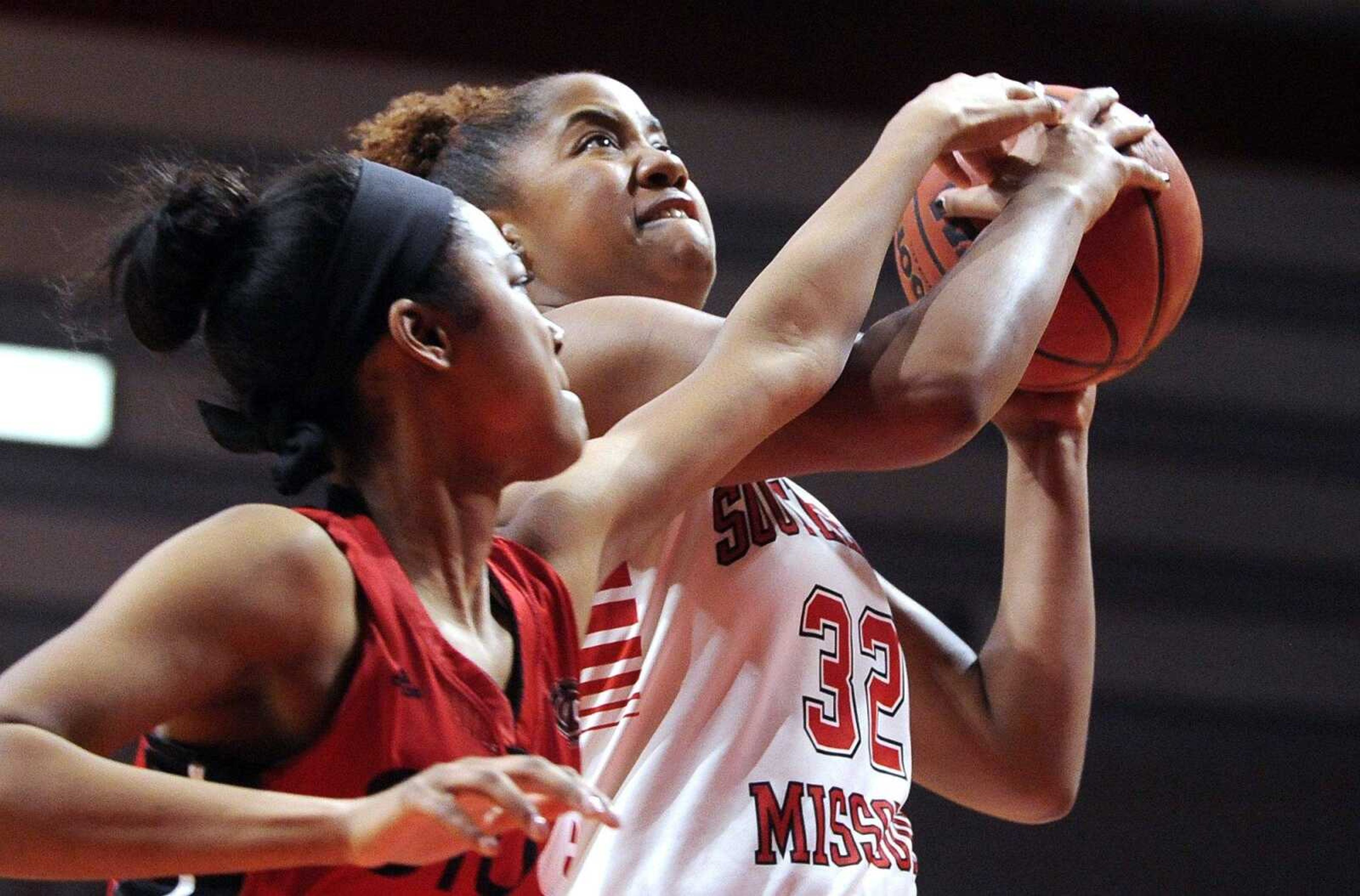 Southeast Missouri State's Imani Johnson drives to the basket against SIUE's Amri Wilder during the third quarter Wednesday, Feb. 24, 2016 at the Show Me Center.