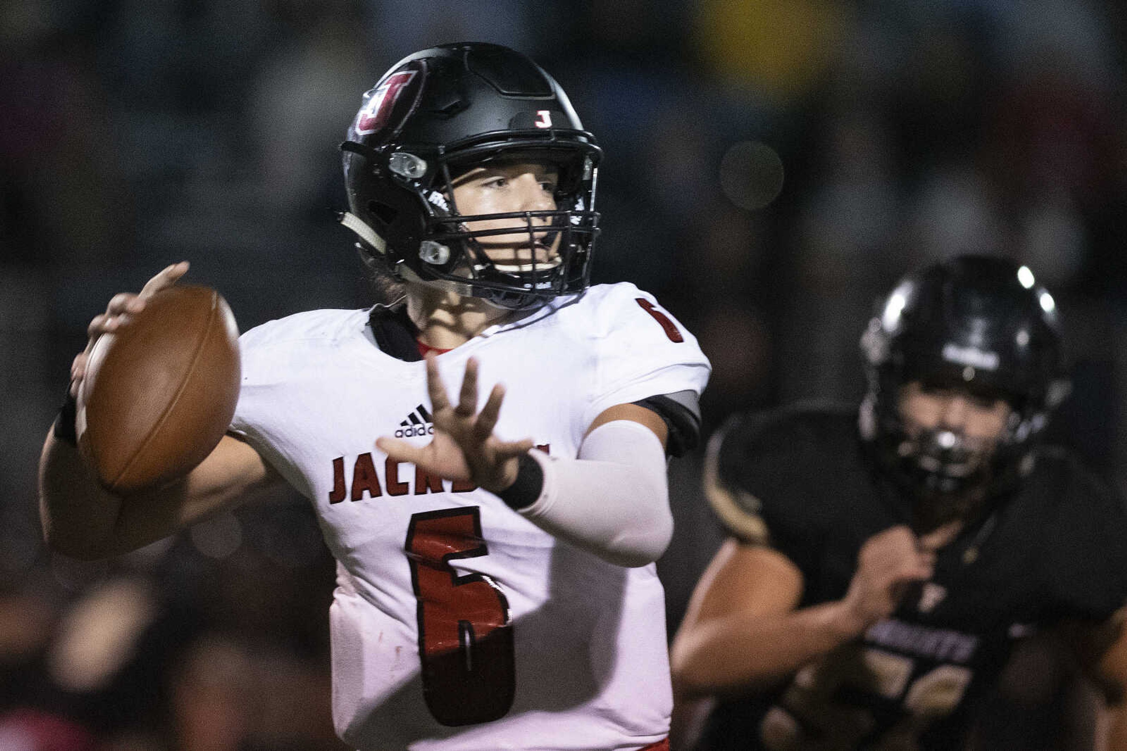 Jackson's Cael Welker (6) handles the ball during the Jackson Indians' 35-14 victory over Farmington on Friday, Oct. 4, 2019, in Farmington, Missouri.