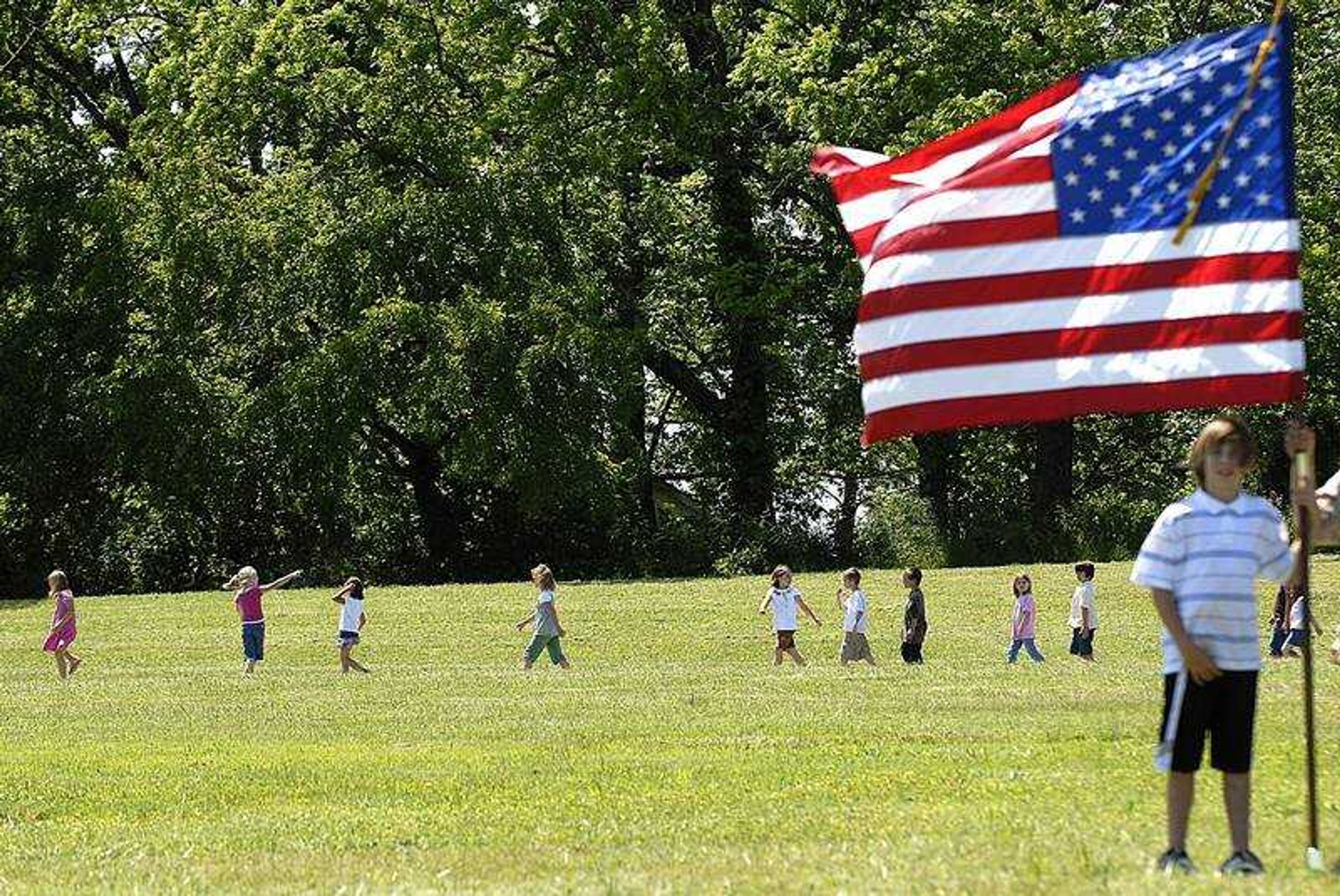 AARON EISENHAUER ~ aeisenhauer@semissourian.com
Students at South Elementary in Jackson finish the final lap for their Walk Across America program on Wednesday, May 28, 2008 at the school. The students collectively walked 8,163 miles, exceeding their goal of 3,600 miles, the distance from New York to Los Angeles.