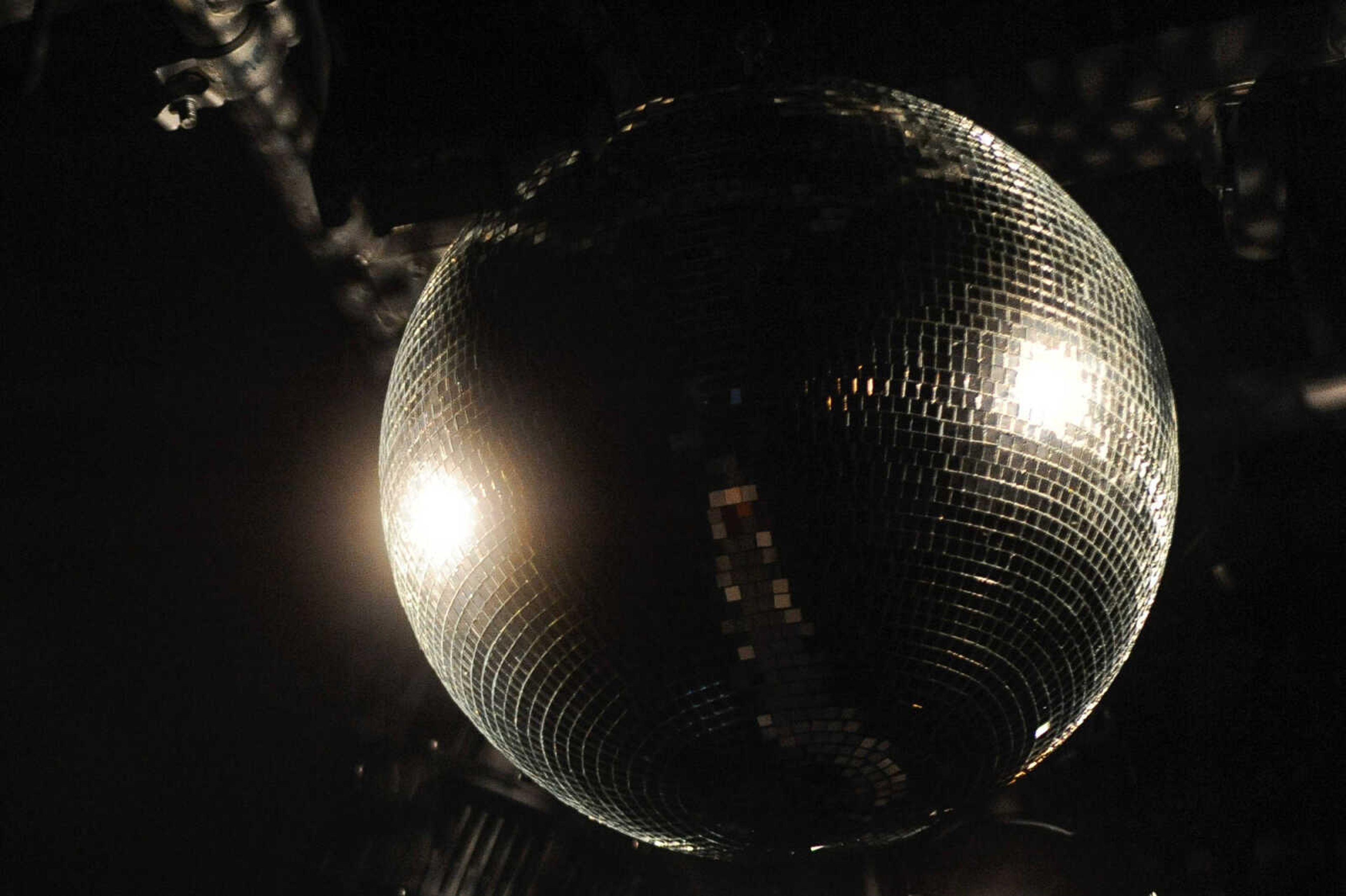 GLENN LANDBERG ~ glandberg@semissourian.com


Disco balls illuminated the Osage Centre for the VintageNOW fashion show Saturday, October 24, 2015.