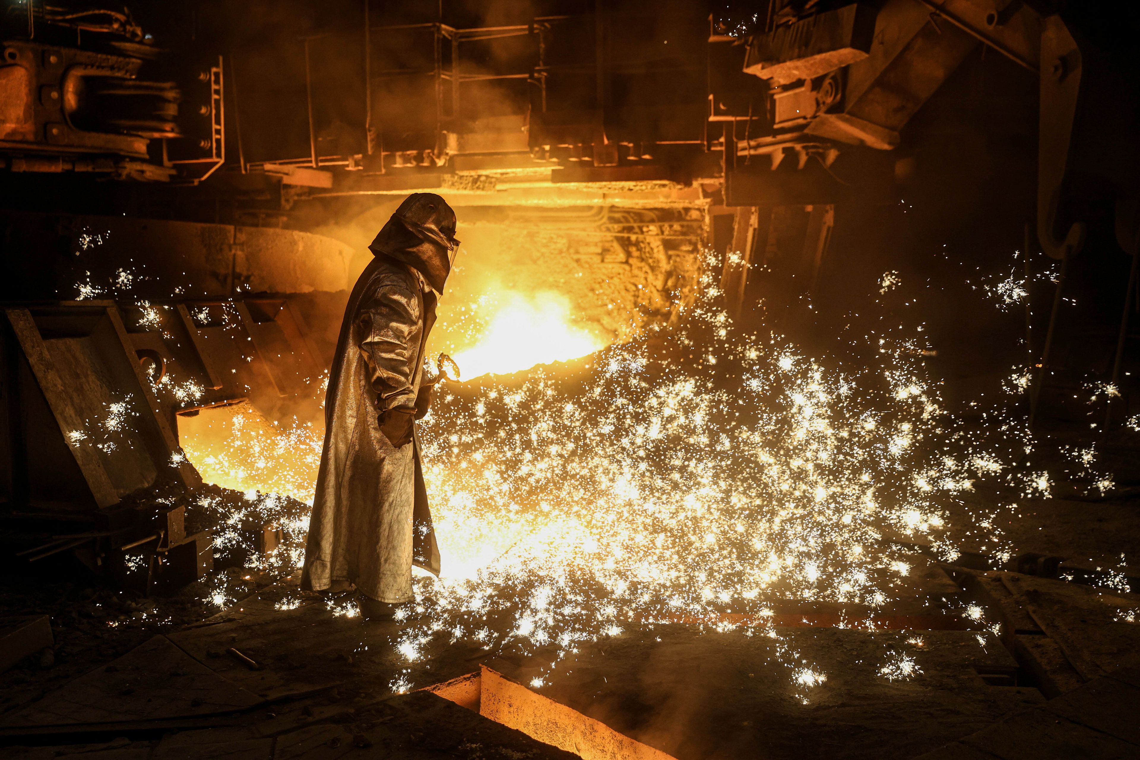 A metallurgist works at a blast furnace in the Zaporizhstal steel factory in Zaporizhzhia, Ukraine, Nov. 11, 2024. (AP Photo/Kateryna Klochko)