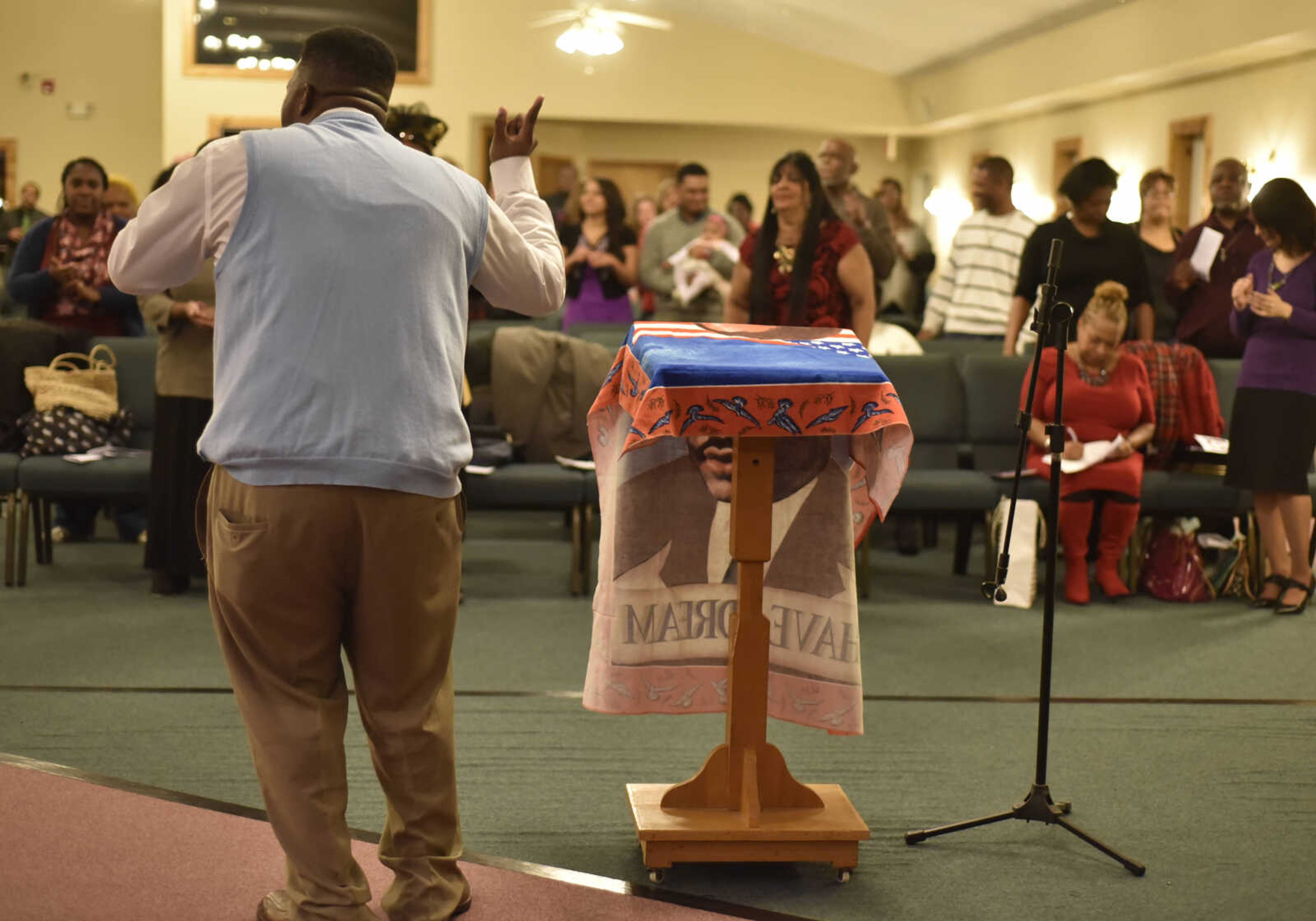 BEN MATTHEWS ~ bmatthews@semissourian.com&nbsp;Attendees at the 27th Annual Dr. Martin Luther King, Jr. Community Celebration Program give praise on January 15, 2017 at Greater Dimensions Church in Cape Girardeau.