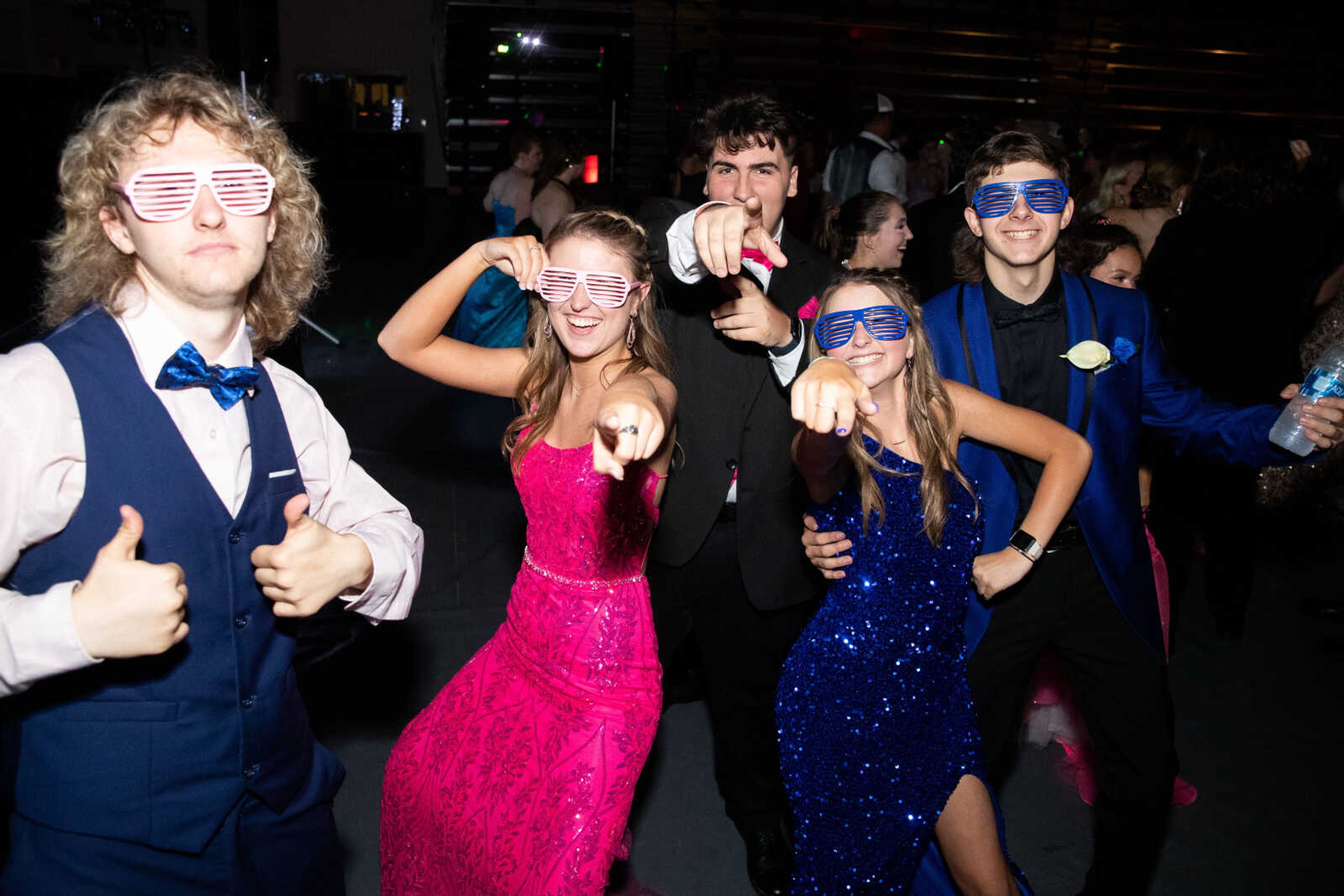 Alan Crawford, Molly Moore, Matthew Massey, Jaden Massey and Abby Moore dance at prom on Saturday, May 6 at Jackson High School.