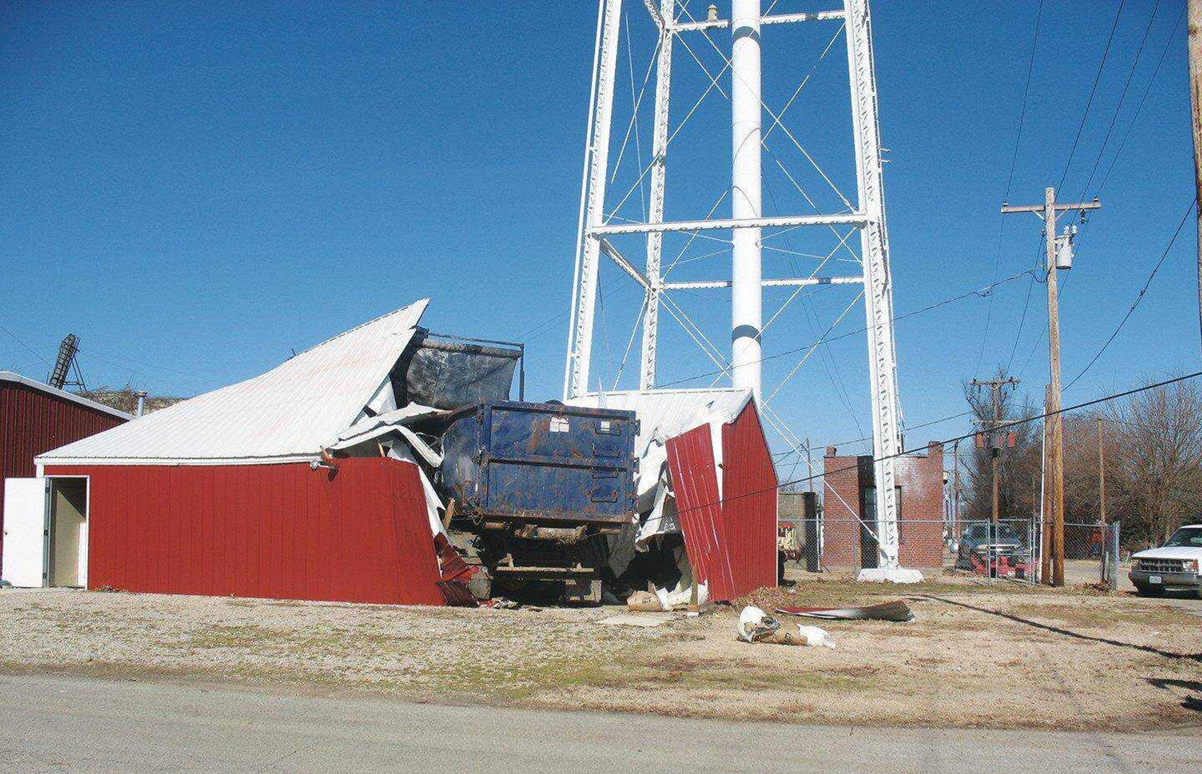 A trash truck from Branum&#8217;s Disposal plowed through the Hornersville Fire Department&#8217;s new meeting and training building Wednesday morning after the driver, Richard Reed, suffered a stroke. (Laura Ford ~ Daily Dunklin Democrat)