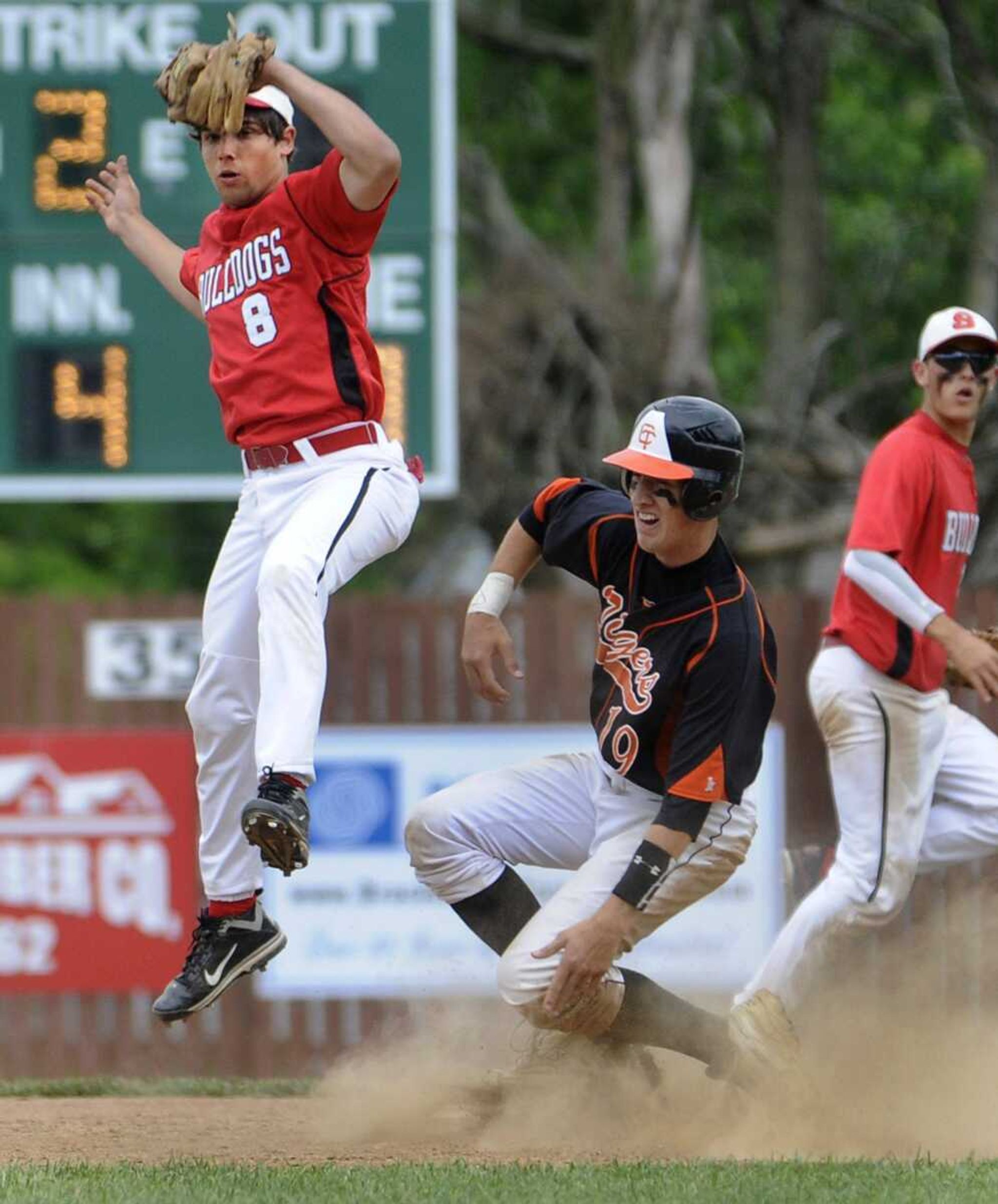 Central's Andrew Williams reaches second base safely as Sikeston second baseman Blake Newman grabs a high throw during the fourth inning of the Class 4 District 1 title game Wednesday, May 18, 2011 at Farmington, Mo. (Fred Lynch)