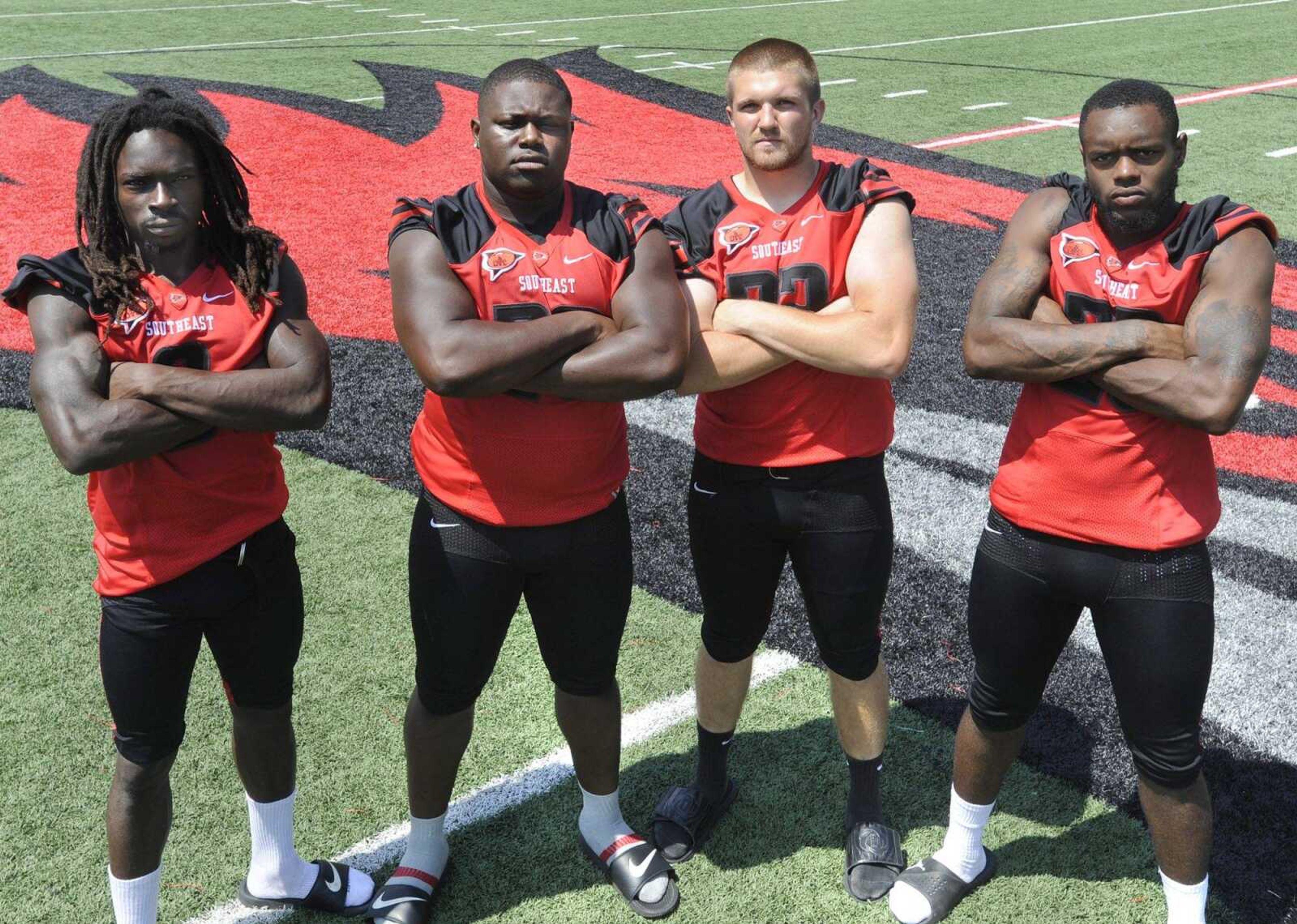 From left to right, running backs Tremane McCullough, Lewis Washington, Brendan Stewart and DeMichael Jackson. (Fred Lynch)