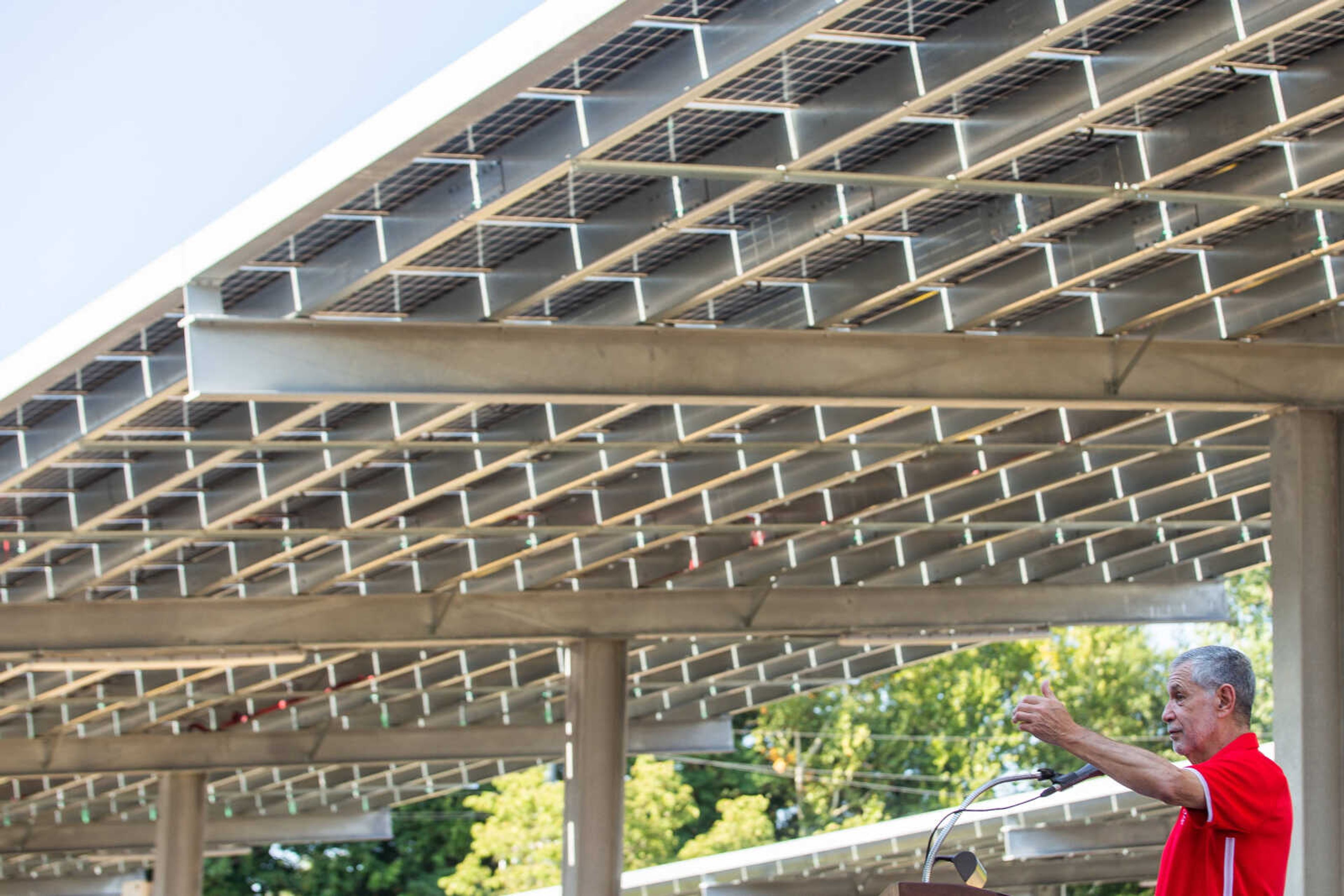 SEMO University President Carlos Vargas speaks at a ribbon cutting ceremony marking the official start of operation for the solar panels constructed by Ameren Missouri in the parking lots at the Show Me Center on Thursday, Aug. 25.