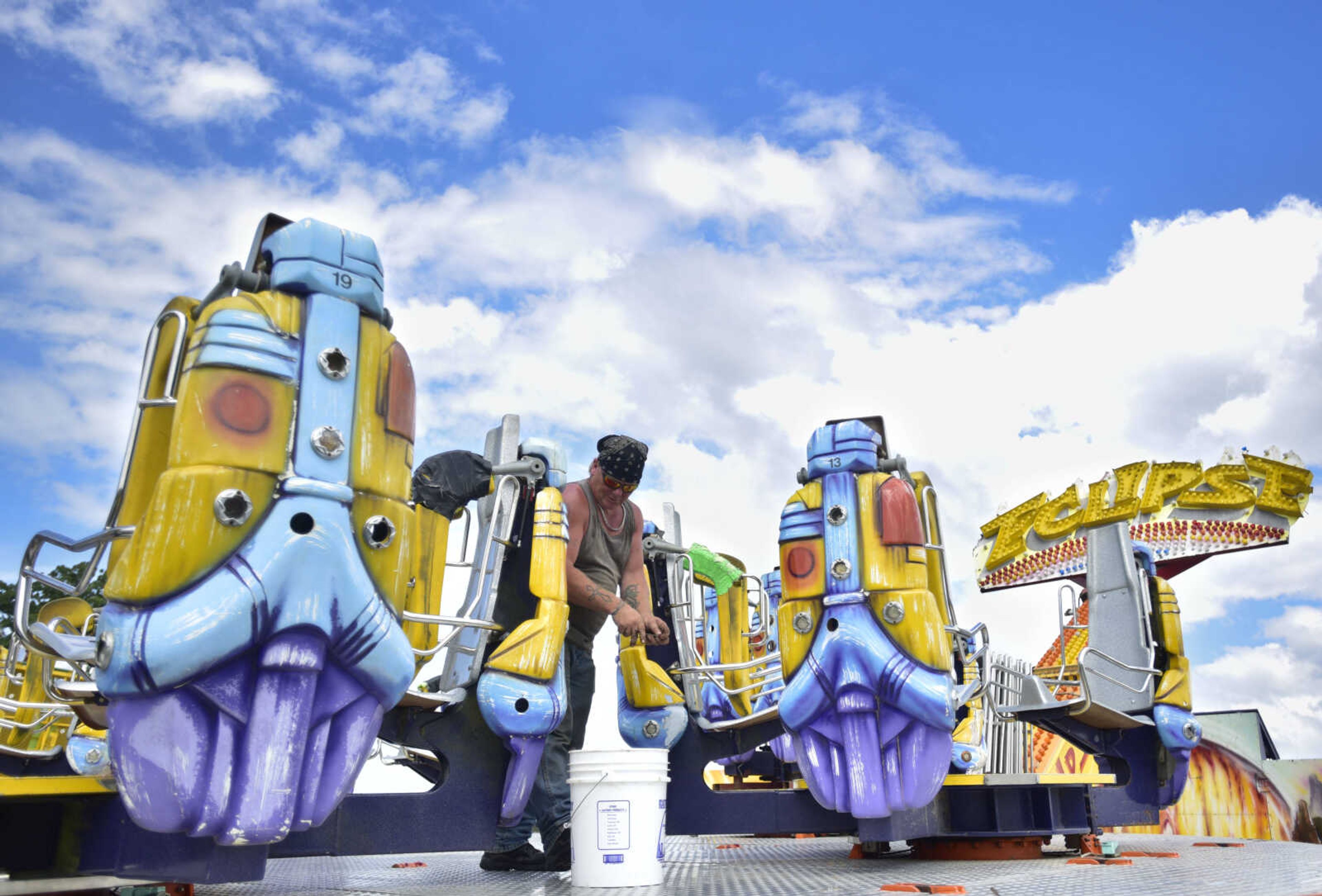 The Eclipse ride is constructed at the SEMO District Fairgrounds Thursday, Sept. 6, 2018, in Cape Girardeau.