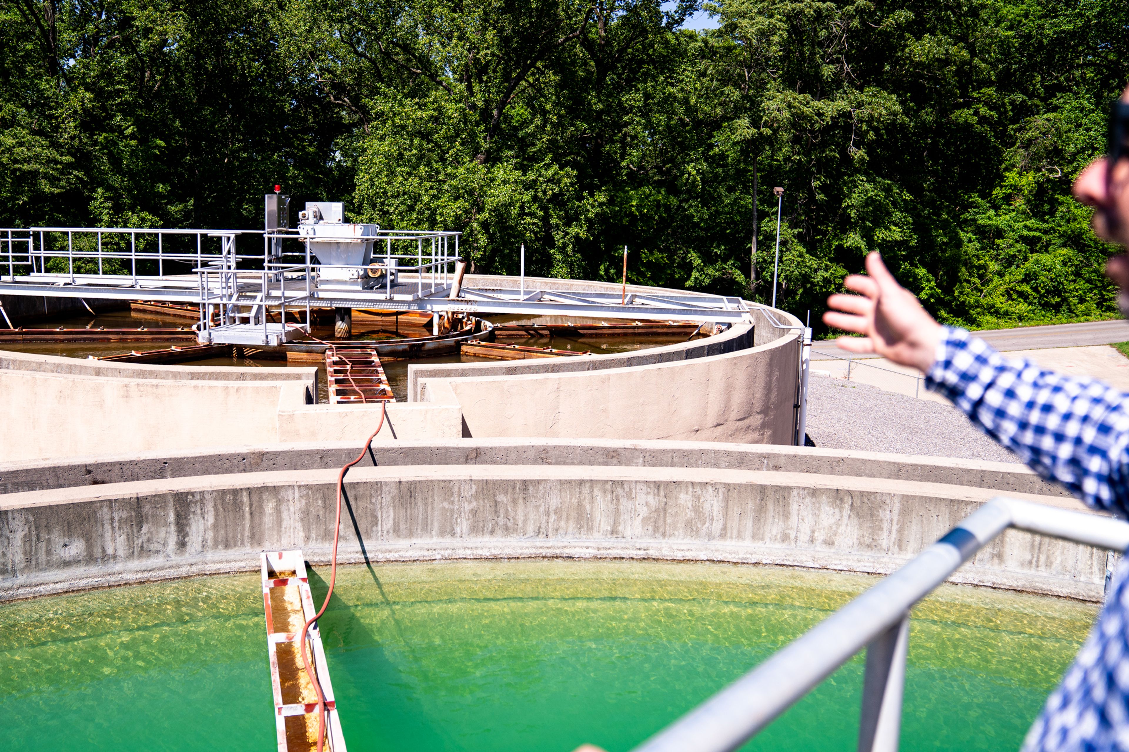 JJ Ridings points to one of the Cape Rock Water Treatment plant's clarifiers May 9, 2024, in Cape Girardeau.