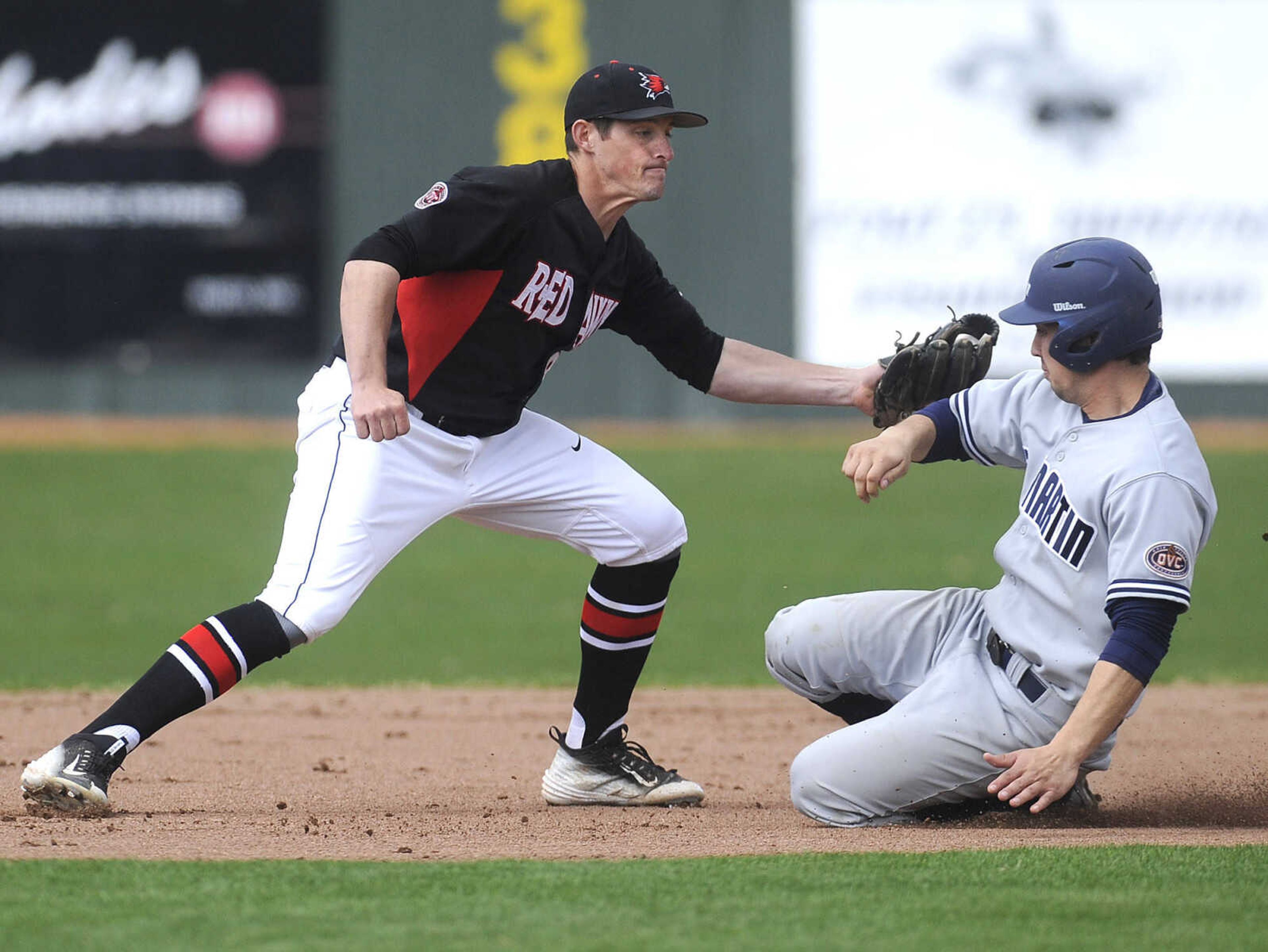 Southeast Missouri State second baseman Jason Blum tags out UT Martin's Andrew Castillo on a steal attempt during the first inning Friday, March 20, 2015 at Capaha Field. (Fred Lynch)