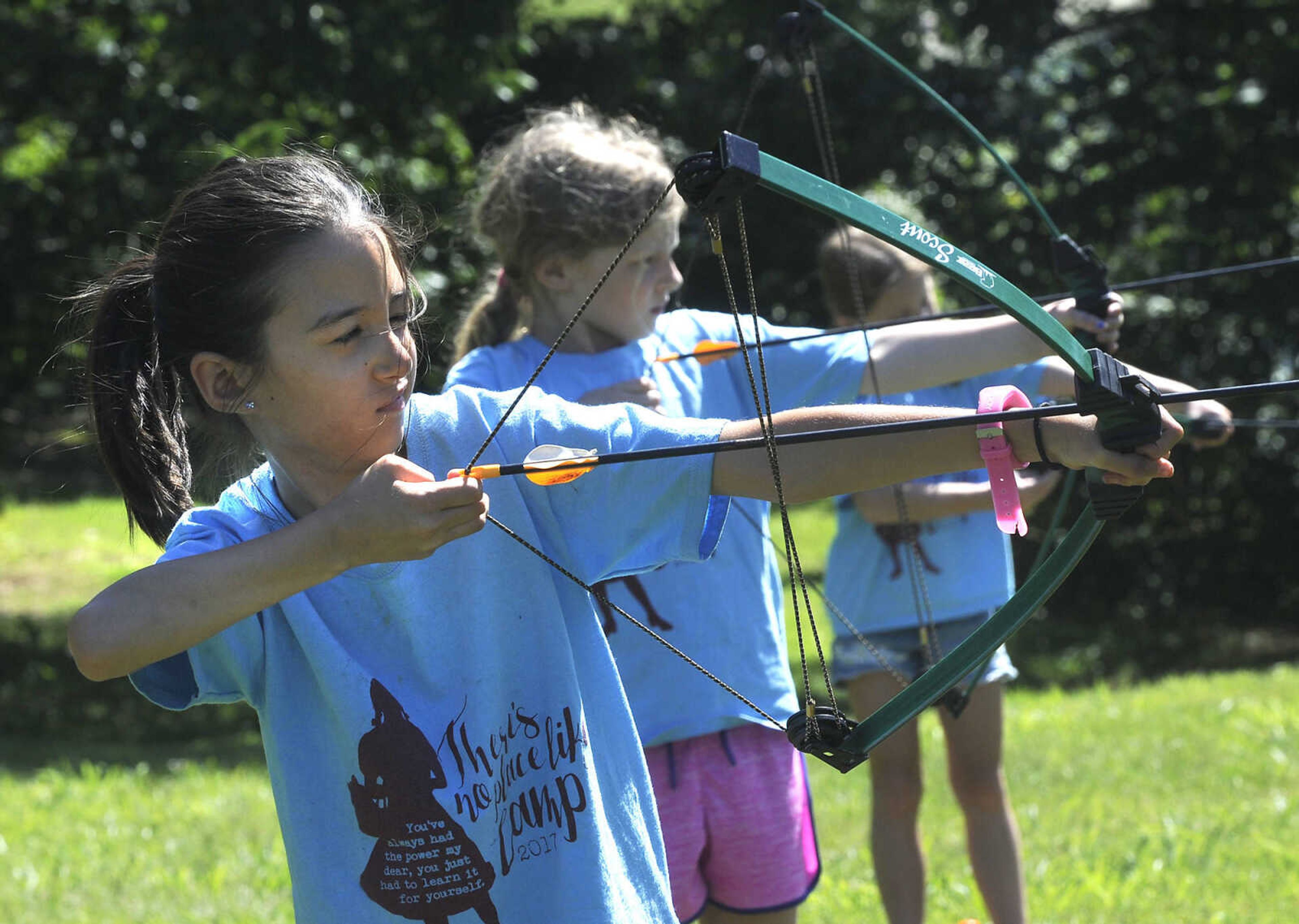 FRED LYNCH ~ flynch@semissourian.com
Brownie Girl Scout Corinna Fisher draws her bow at the archery range Thursday, June 8, 2017 during Girl Scout day camp at Elks Lake in Cape Girardeau.