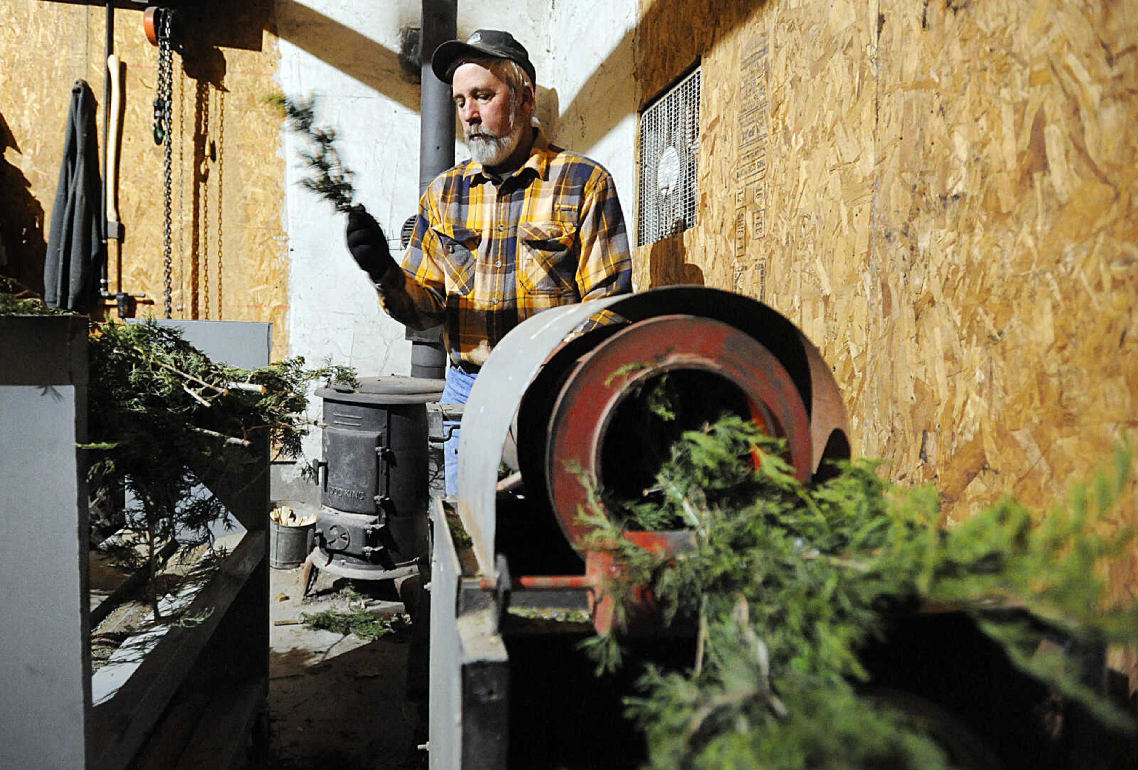 LAURA SIMON ~ lsimon@semissourian.com

Steve Meier makes rope garland, Wednesday, Nov. 26, 2014, at Meier Horse Shoe Pines in Jackson.