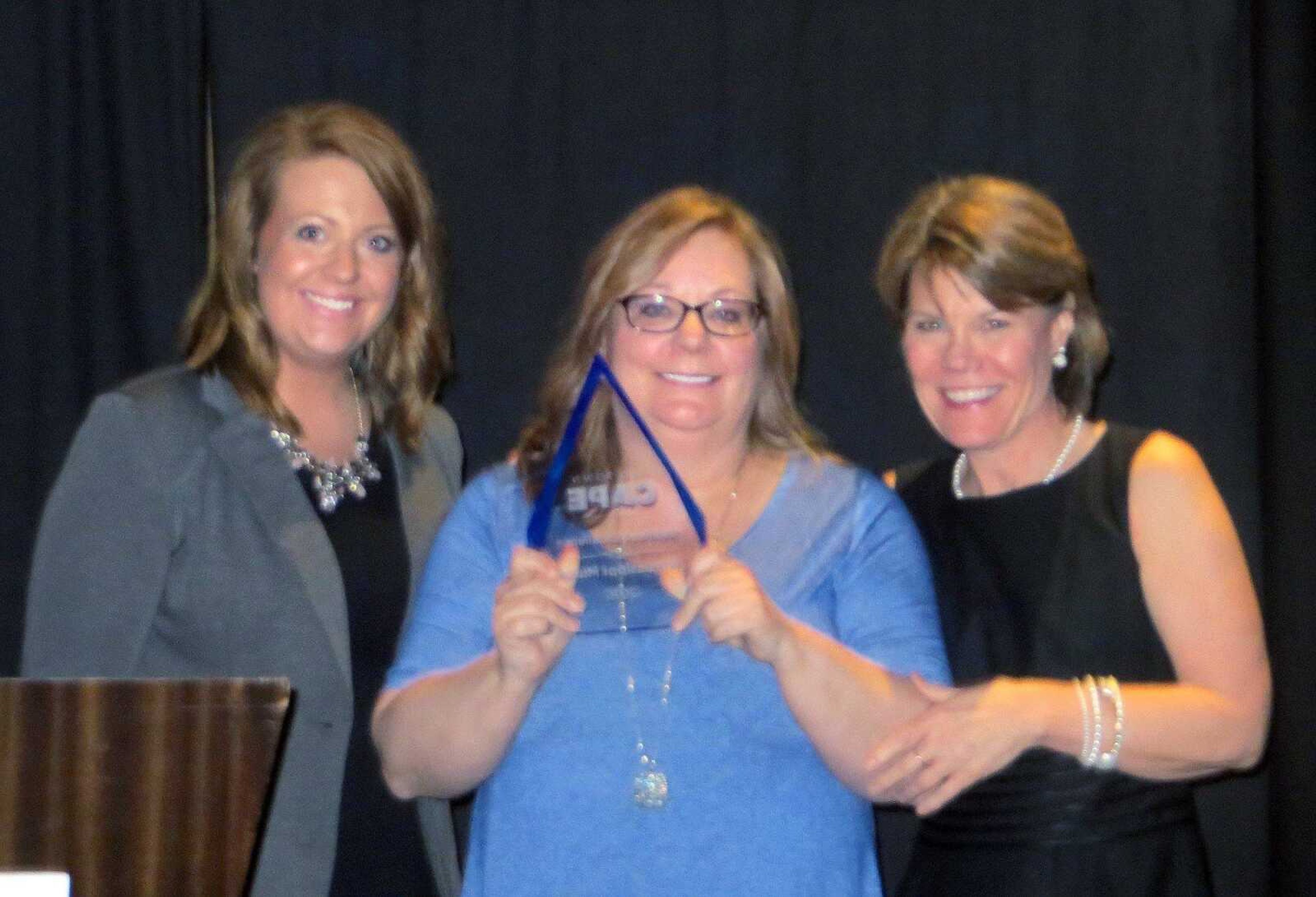 TYLER GRAEF ~ tgraef@semissourian.com
Bo Kleman, Sherry Jennings and Marla Mills pose after Old Town Cape's annual awards dinner at the Isle Casino Cape Girardeau Thursday, Feb. 23.