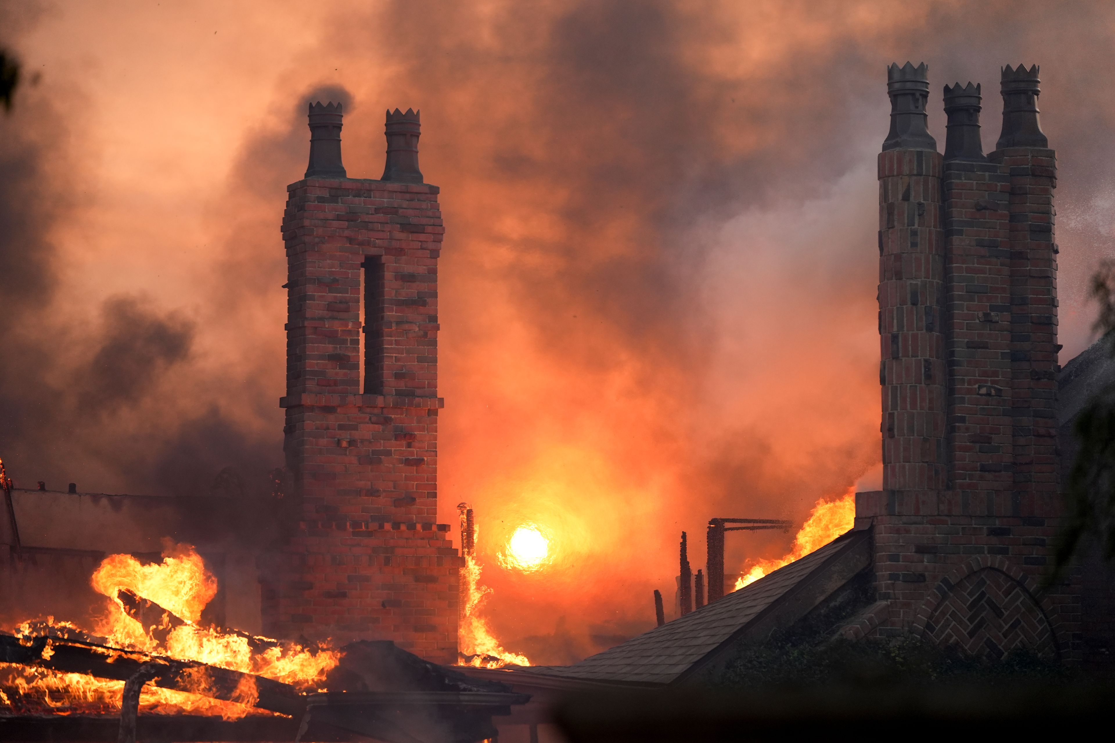 A fire burns in the Mountain fire, Wednesday, Nov. 6, 2024, in Camarillo, Calif. (AP Photo/Marcio Jose Sanchez)