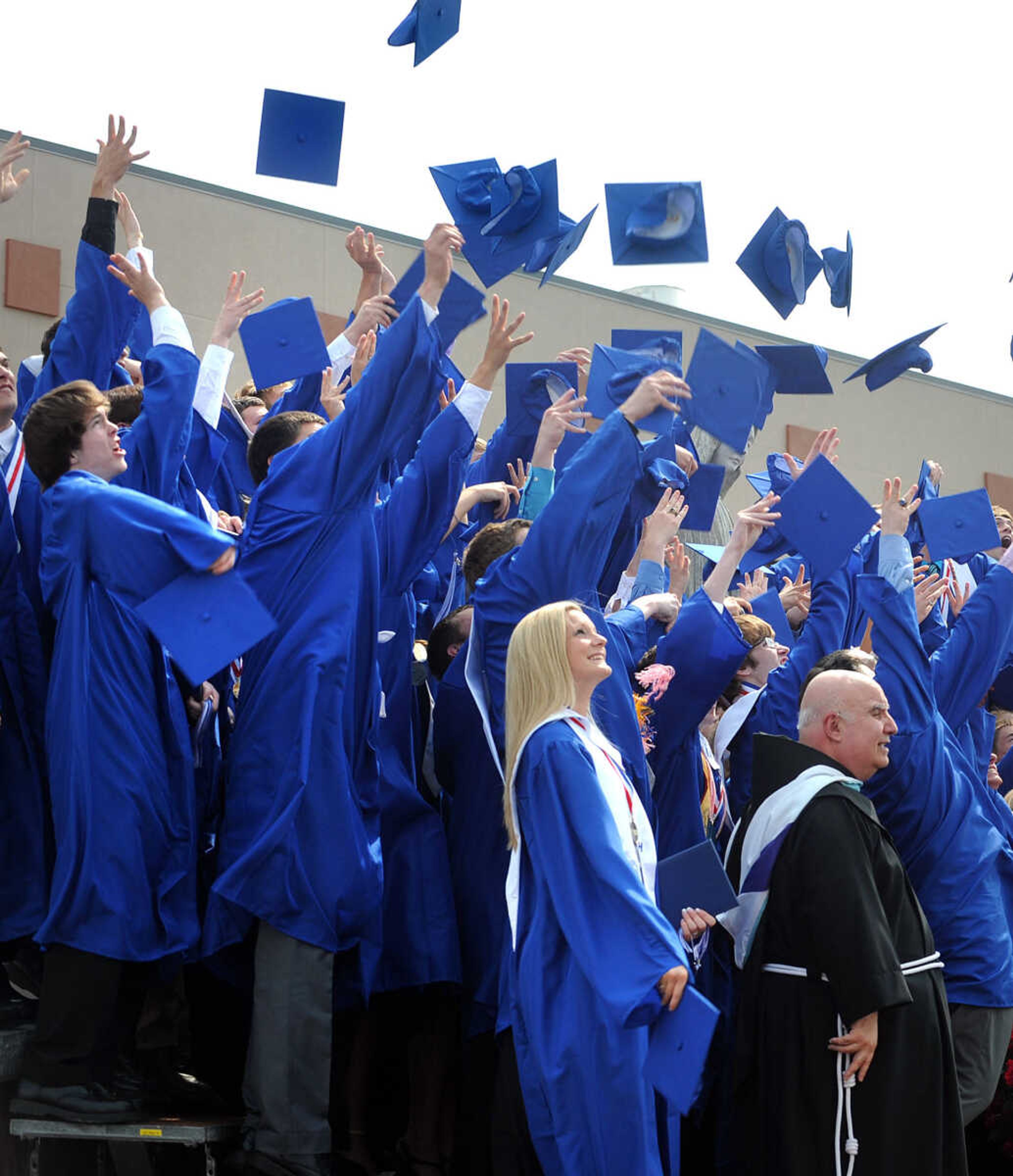 LAURA SIMON ~ lsimon@semissourian.com

The eighty-fifth graduating class of Notre Dame Regional High School throw their hats in the air, Sunday, May 19, 2013, in celebration of their commencement.