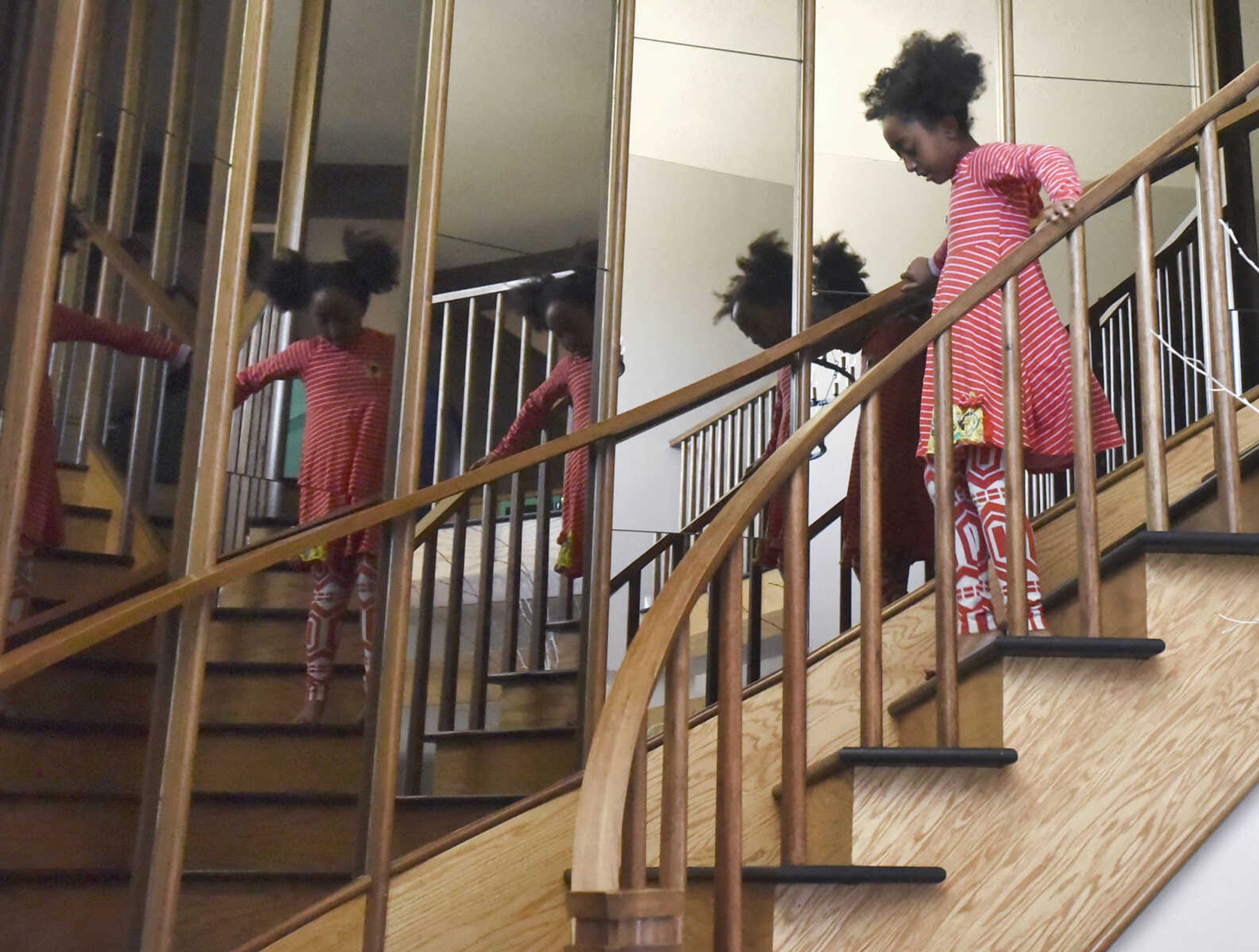 Solie Becking, 8, heads down the stairs on Saturday, Jan. 28, 2017, at the Becking's Cape Girardeau home.