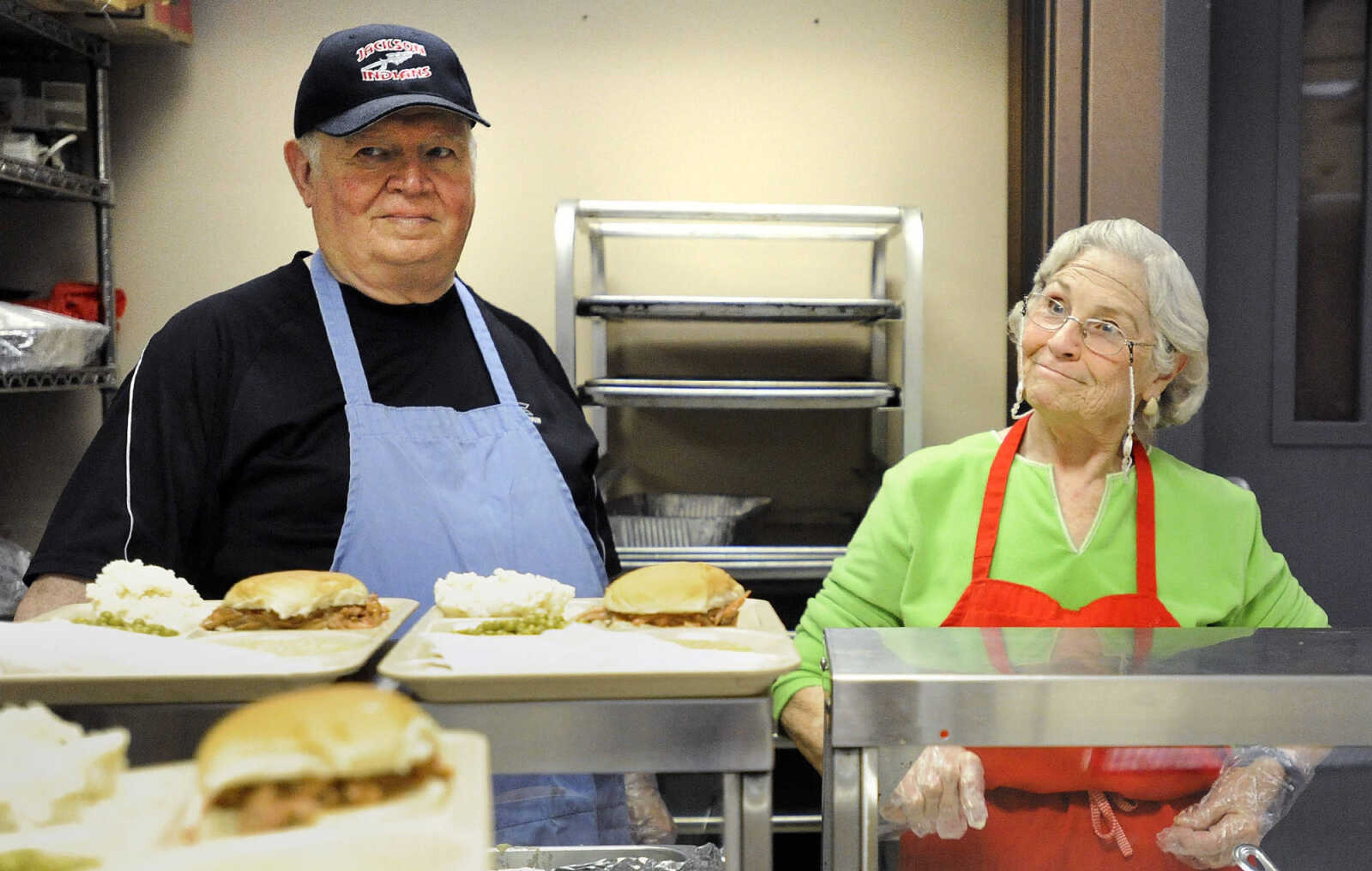 LAURA SIMON ~ lsimon@semissourian.com

Volunteers Robert Bentley and Elaine Shirrell have a little fun Monday afternoon, Feb. 22, 2016, during meals with friends at the Salvation Army in Cape Girardeau. The last two full weeks of the month, the Salvation Army hosts meals with friends, an event where people can come have a hot meal, and also take a meal home.