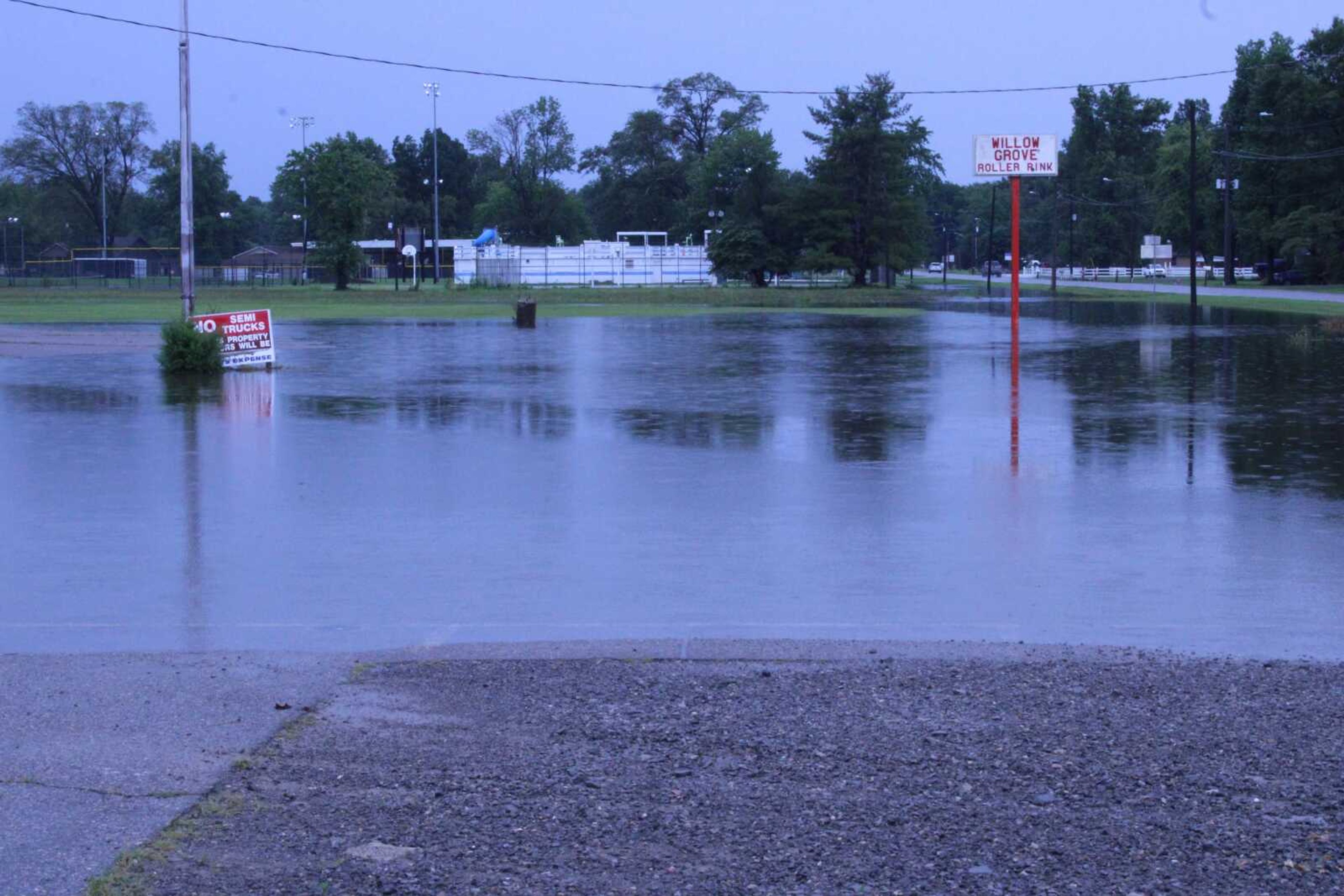 Heavy rains flood Willow Grove Roller Rink parking lot Thursday, Aug. 3, in Chaffee, Missouri.