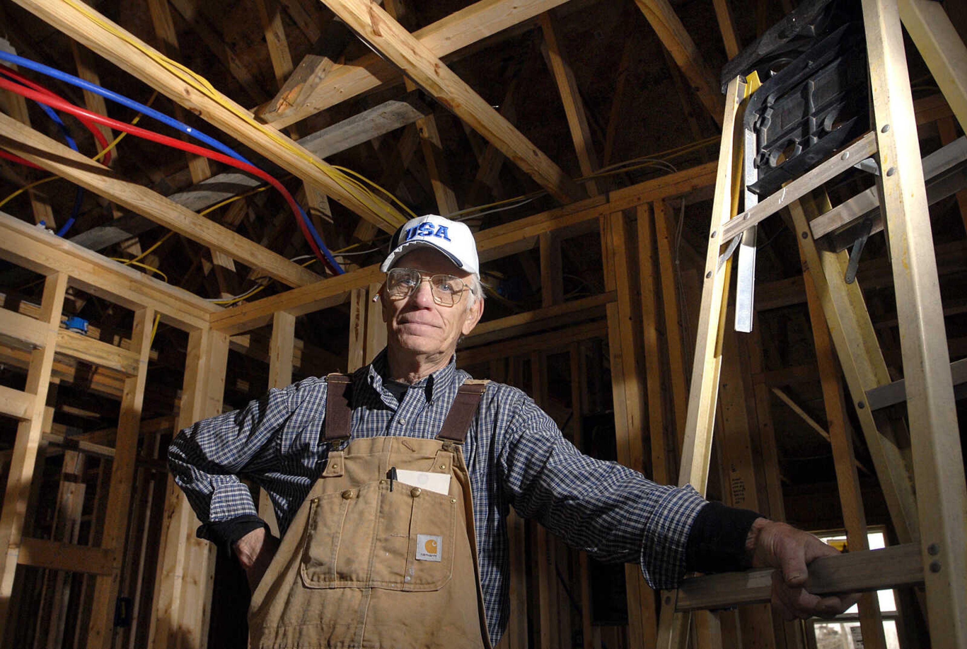 Ervin Belcher inside a new home he is building in Morley, Mo. Friday, February 24, 2012. (Laura Simon)